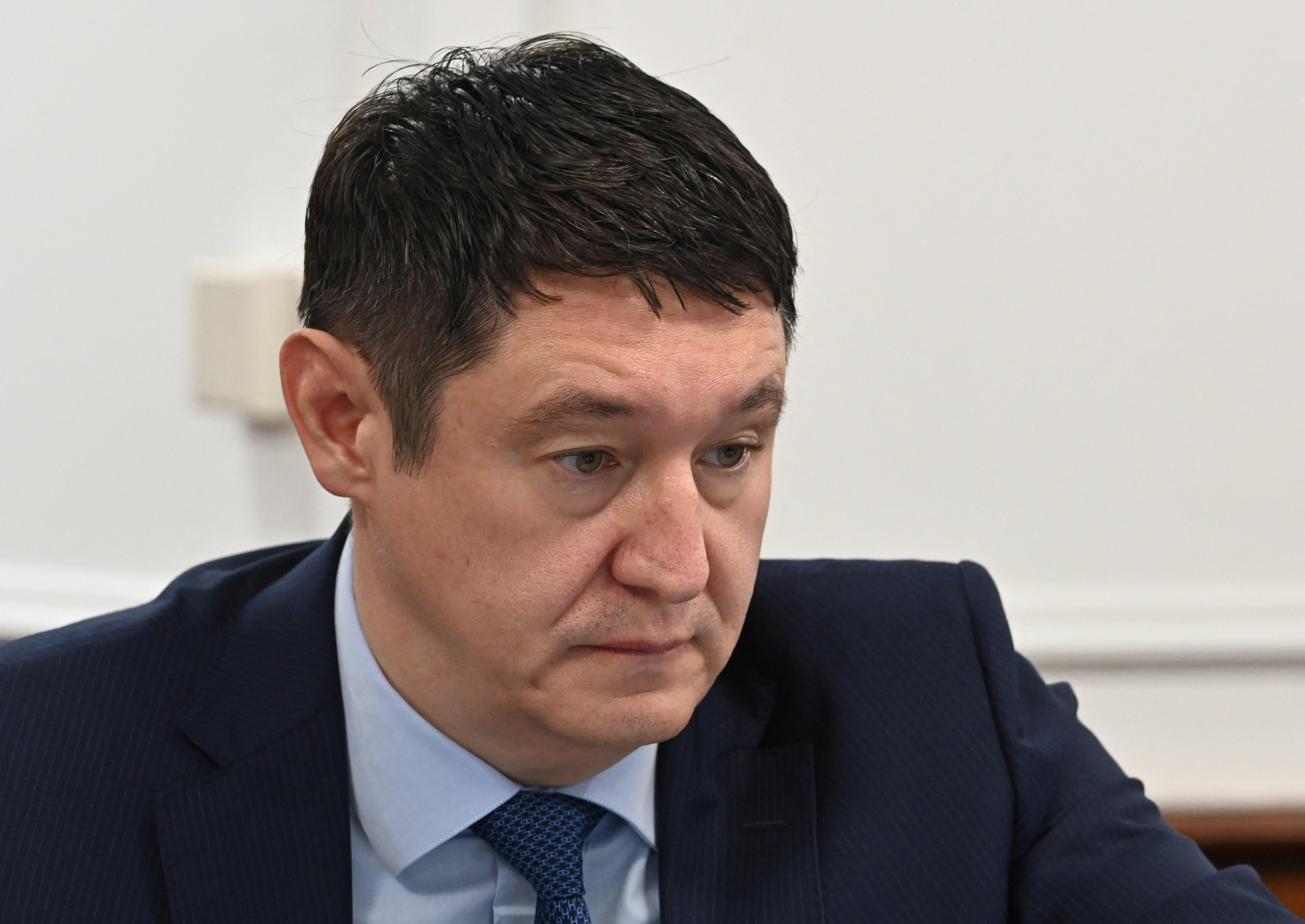 Kazakh Energy Minister Almasadam Satkaliyev attends a government meeting in Astana
