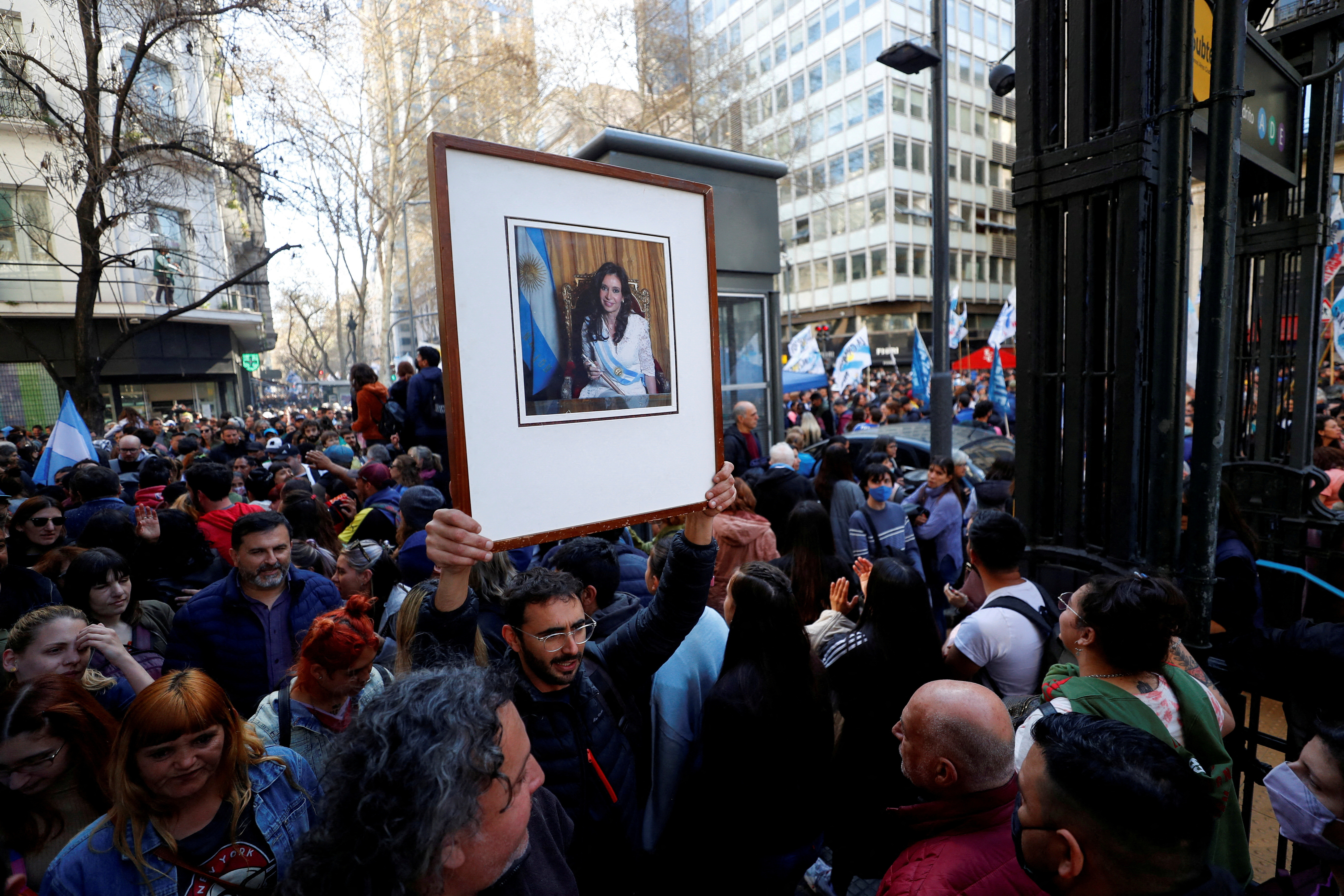 Argentines march to support VP Fernandez after she was pointed at with a gun, in Buenos Aires