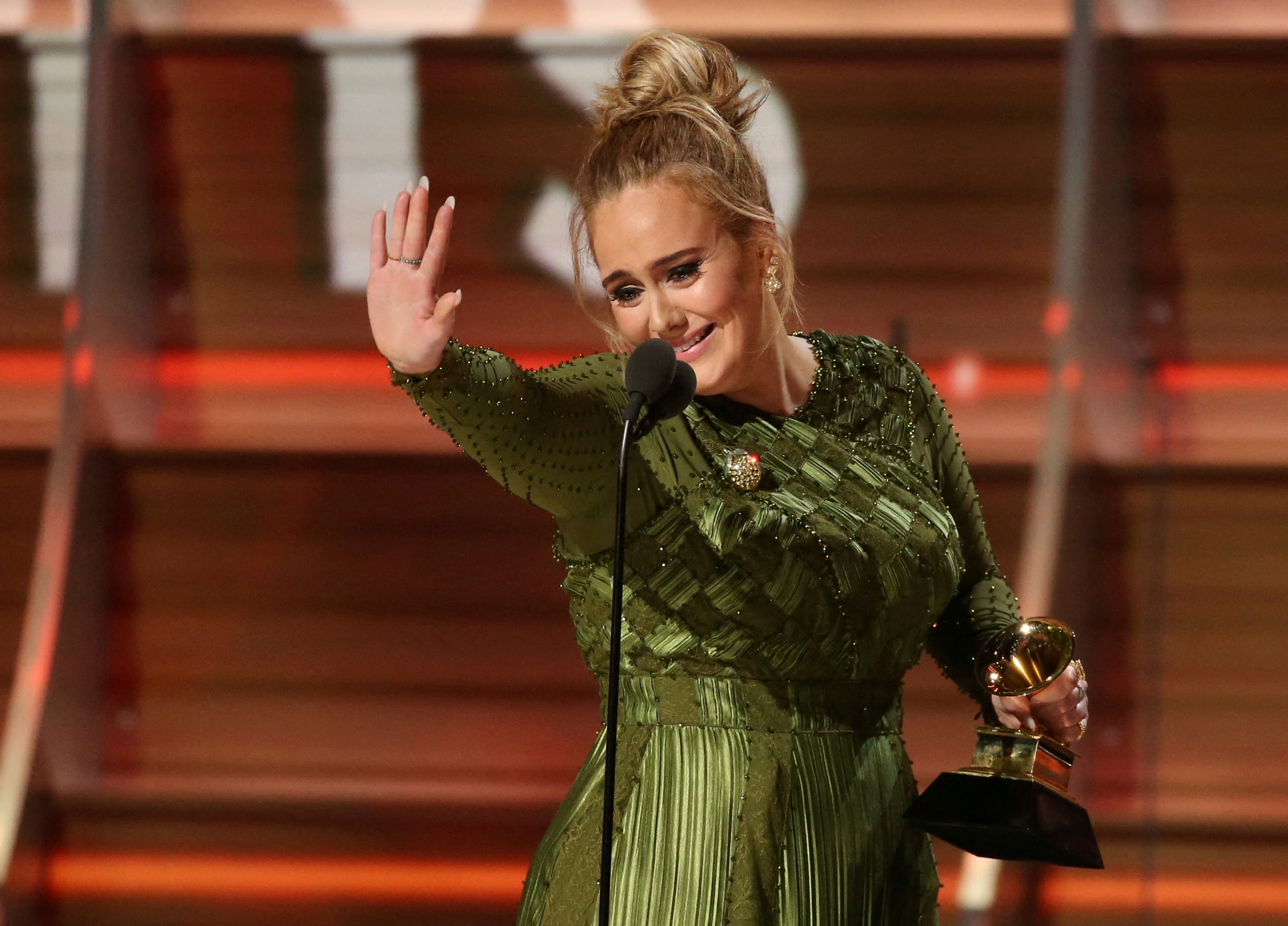 Adele and co-song writer Kurstin accept the Grammy for Song of the Year for 