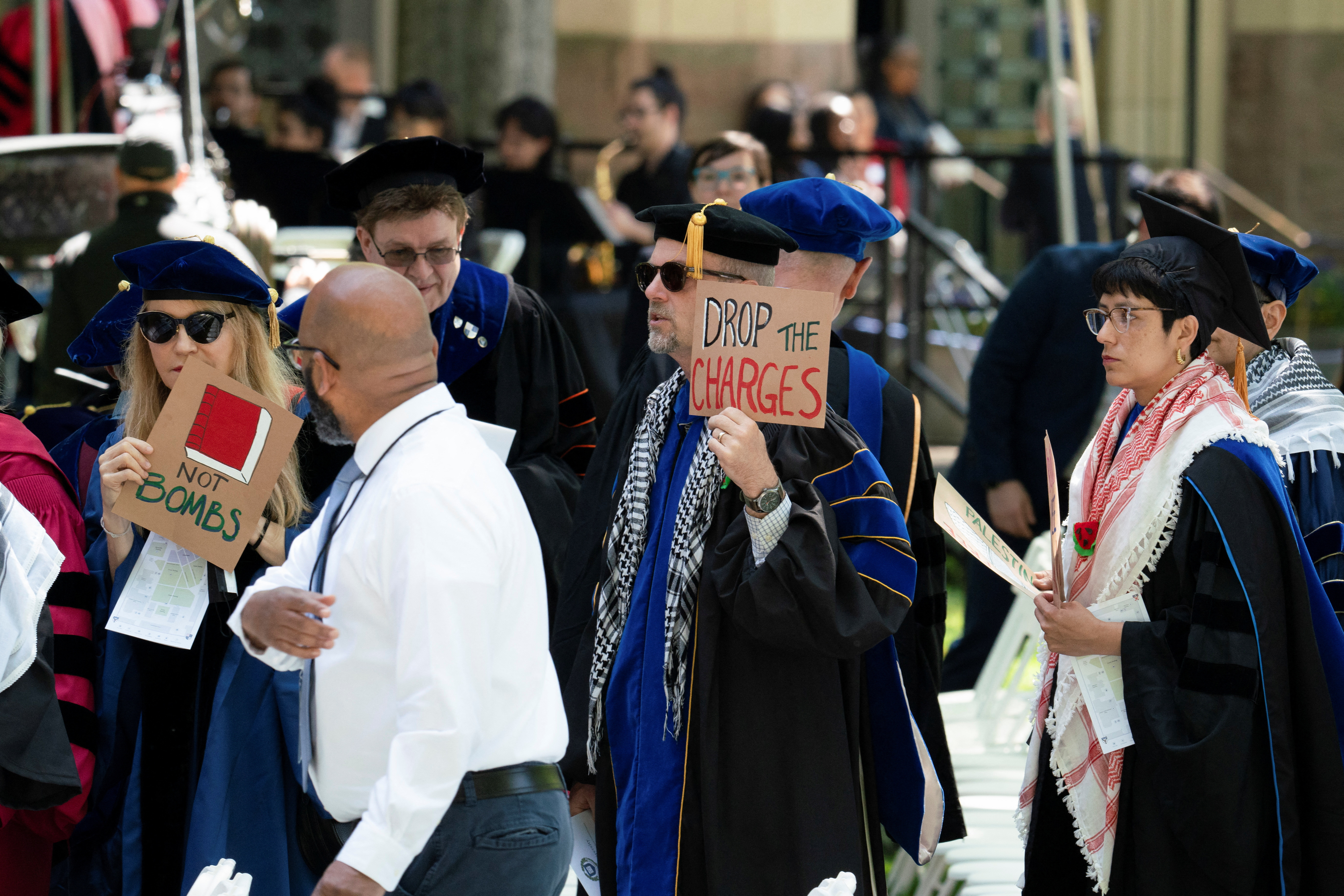Faculty and administrators protest the conflict between Israel and the Palestinian Islamist group Hamas, during the commencement at Yale University