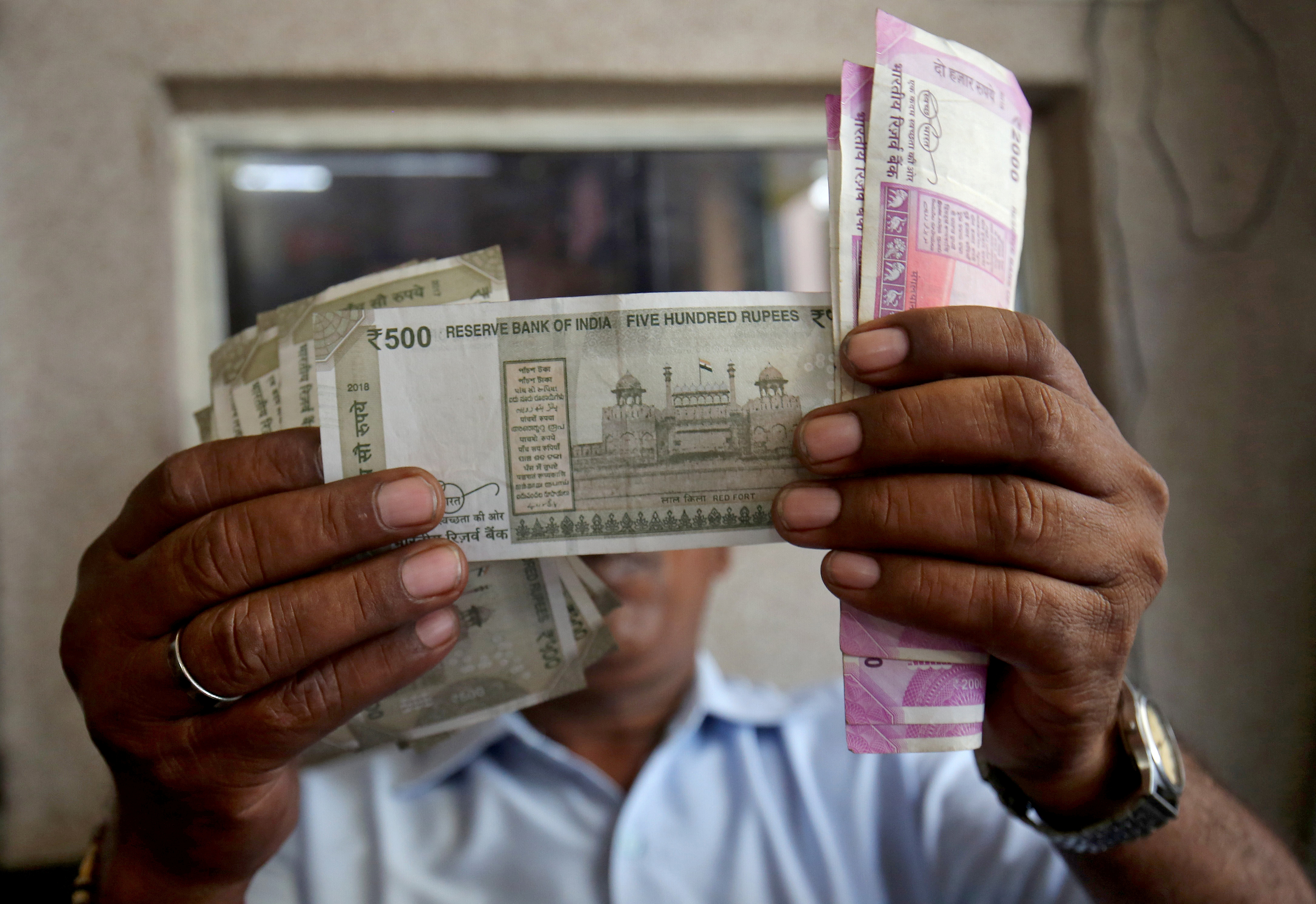 India rupee settlement mechanism draws interest from more nations | Reuters