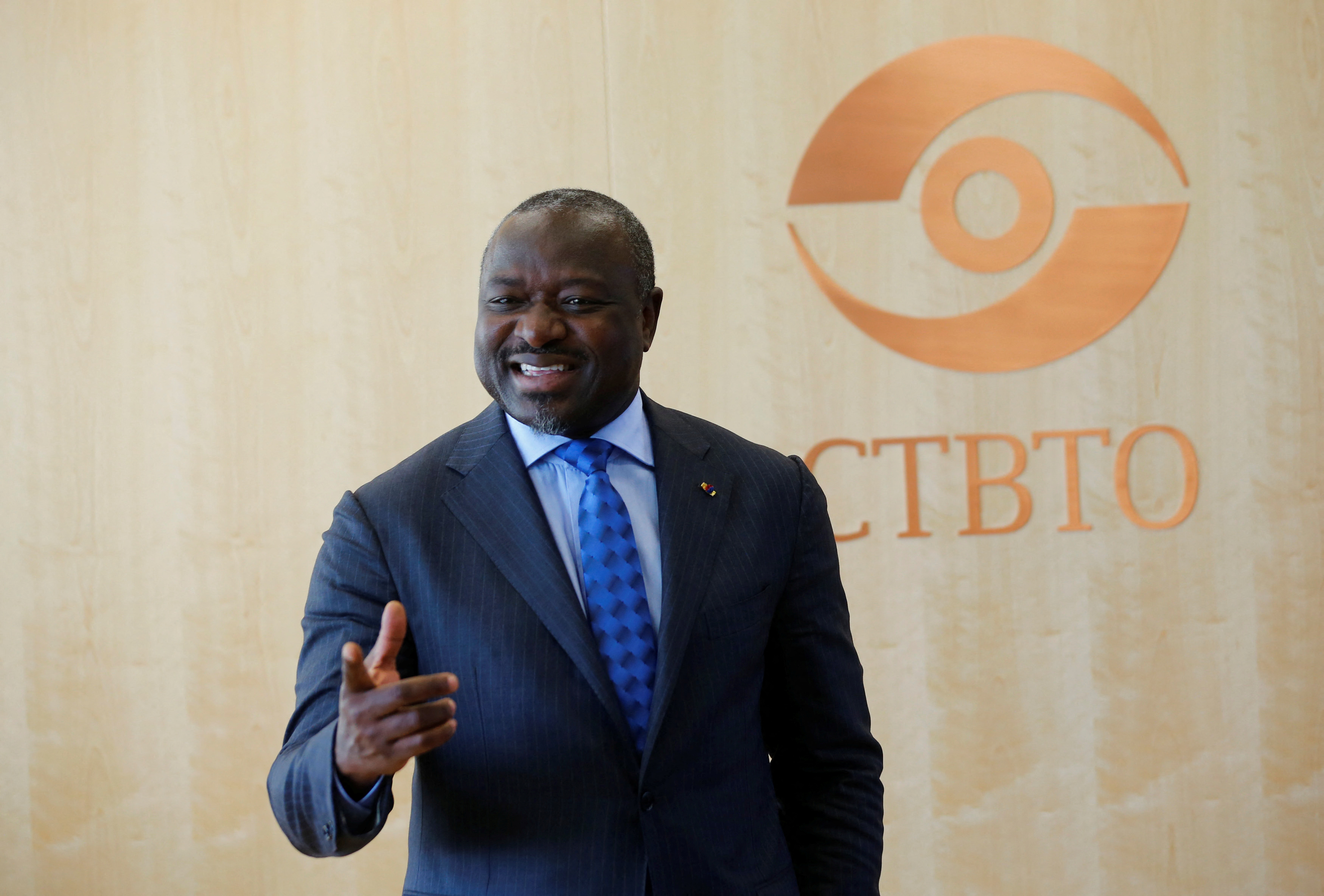 Secretary General of the CTBTO Zerbo gestures during an interview in Vienna