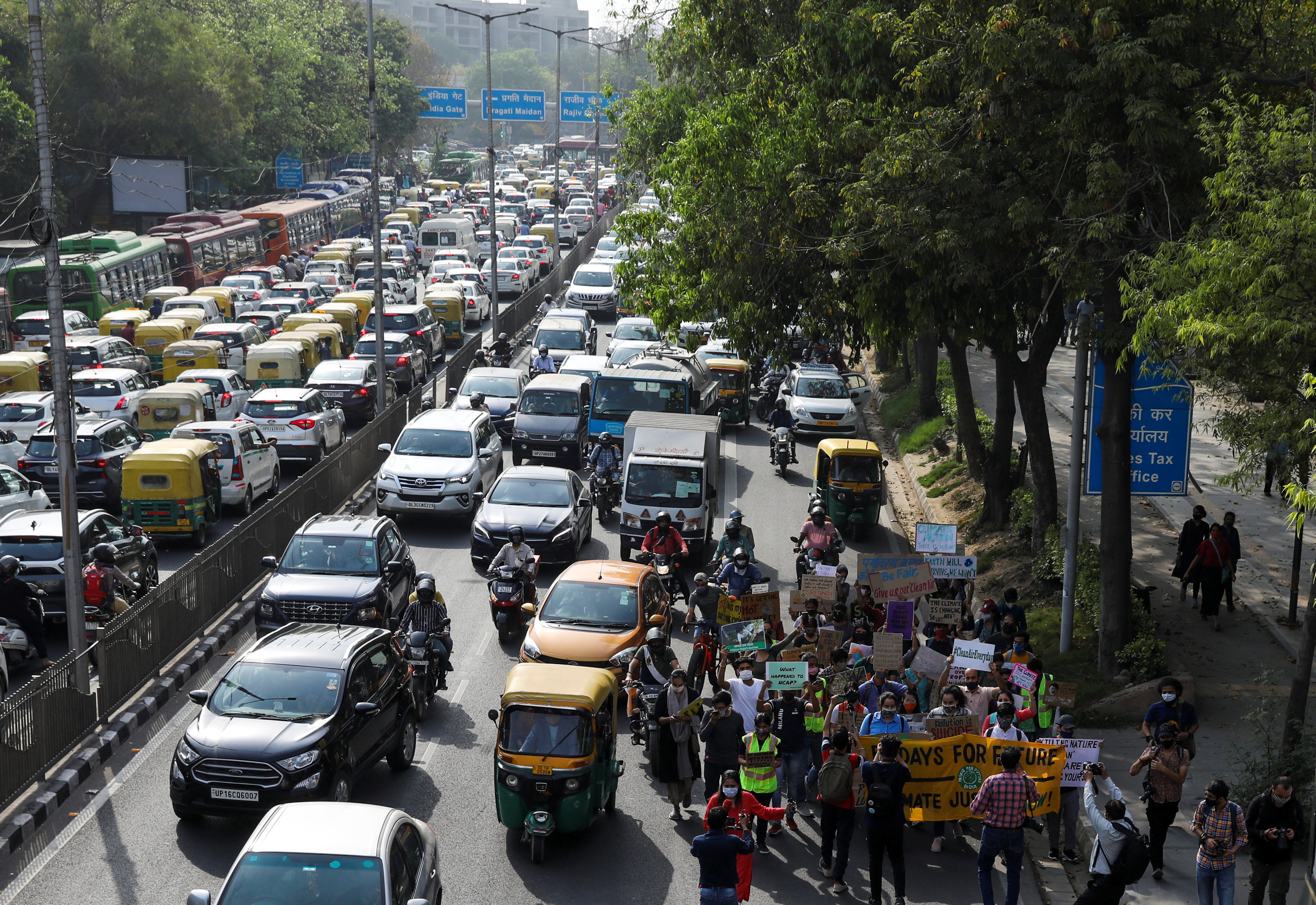People take part in a 'Fridays for Future' march towards the Delhi Secretariat building, in New Delhi