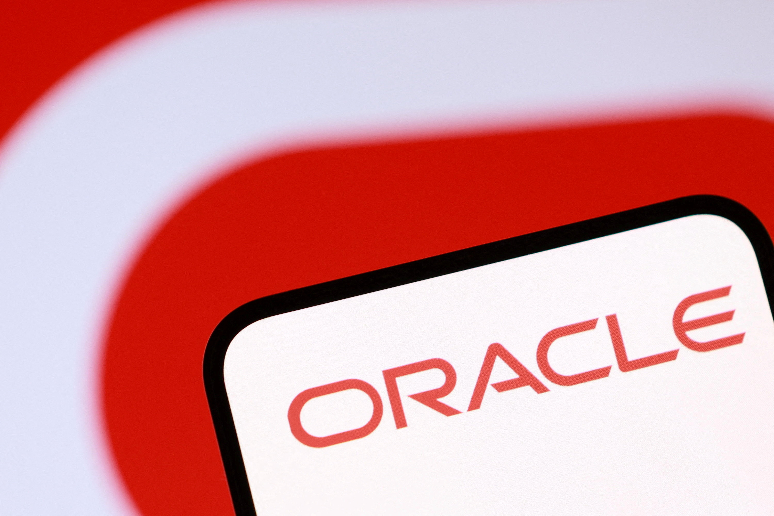 Oracle's AI spending blows past estimates, raising worries over growing debt  | Reuters