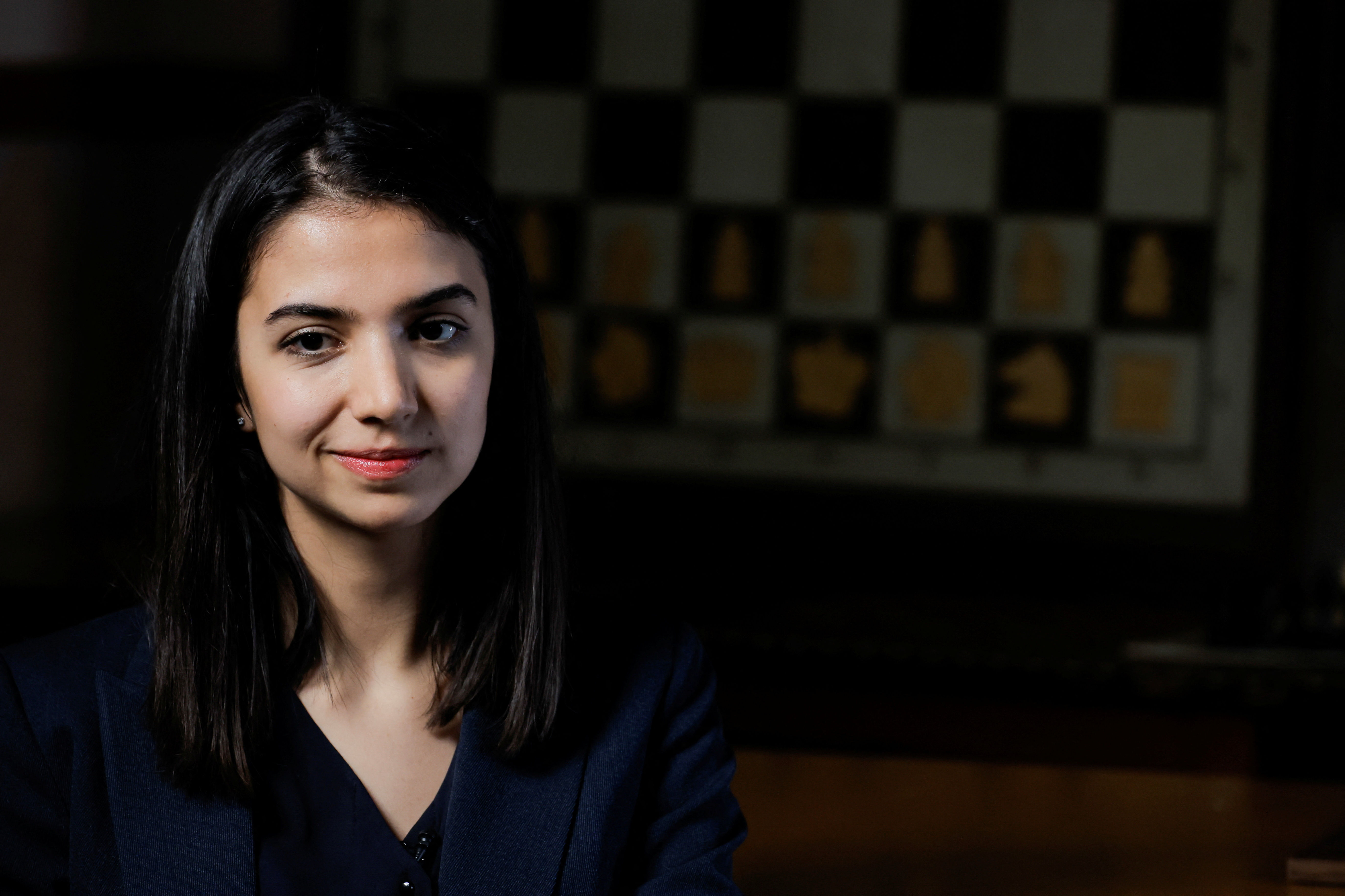 Iranian chess player Sara Khadem gestures during an interview with Reuters
