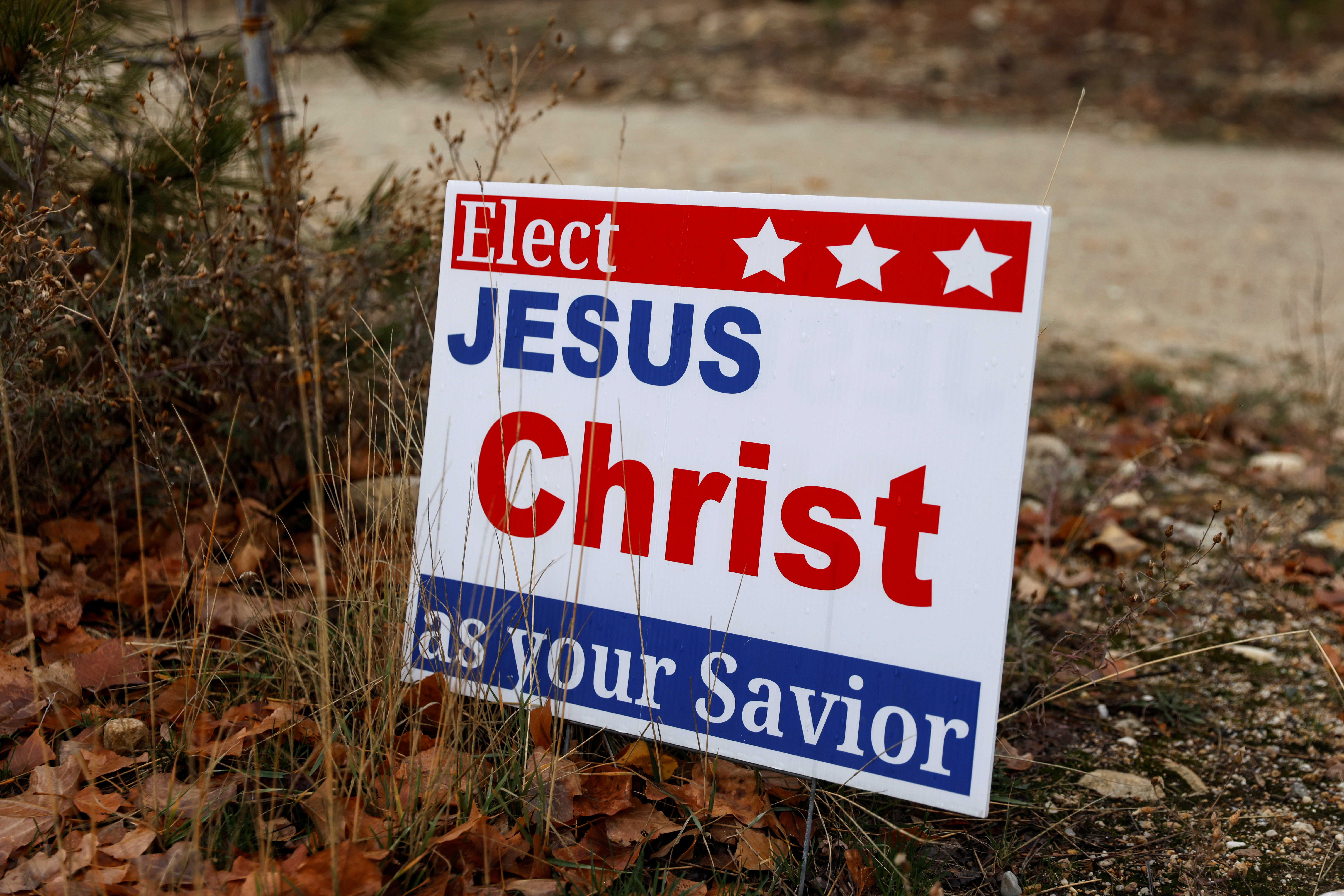 A campaign sign for Jesus sits posted outside a trailer home in Idaho Falls