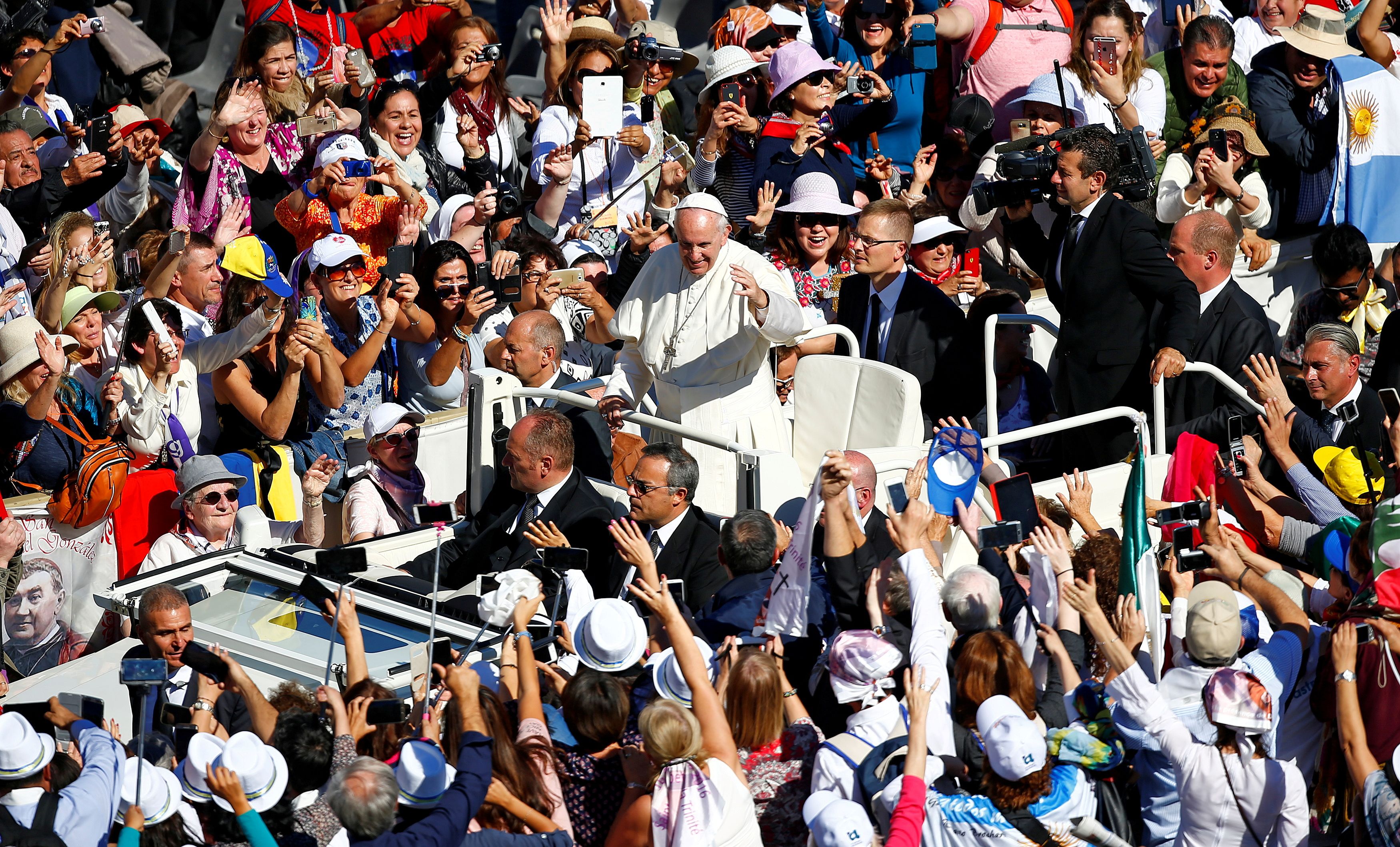 Pope Francis leaves at the end of a canonization mass for seven new saints in Saint Peter's Square at the Vatican
