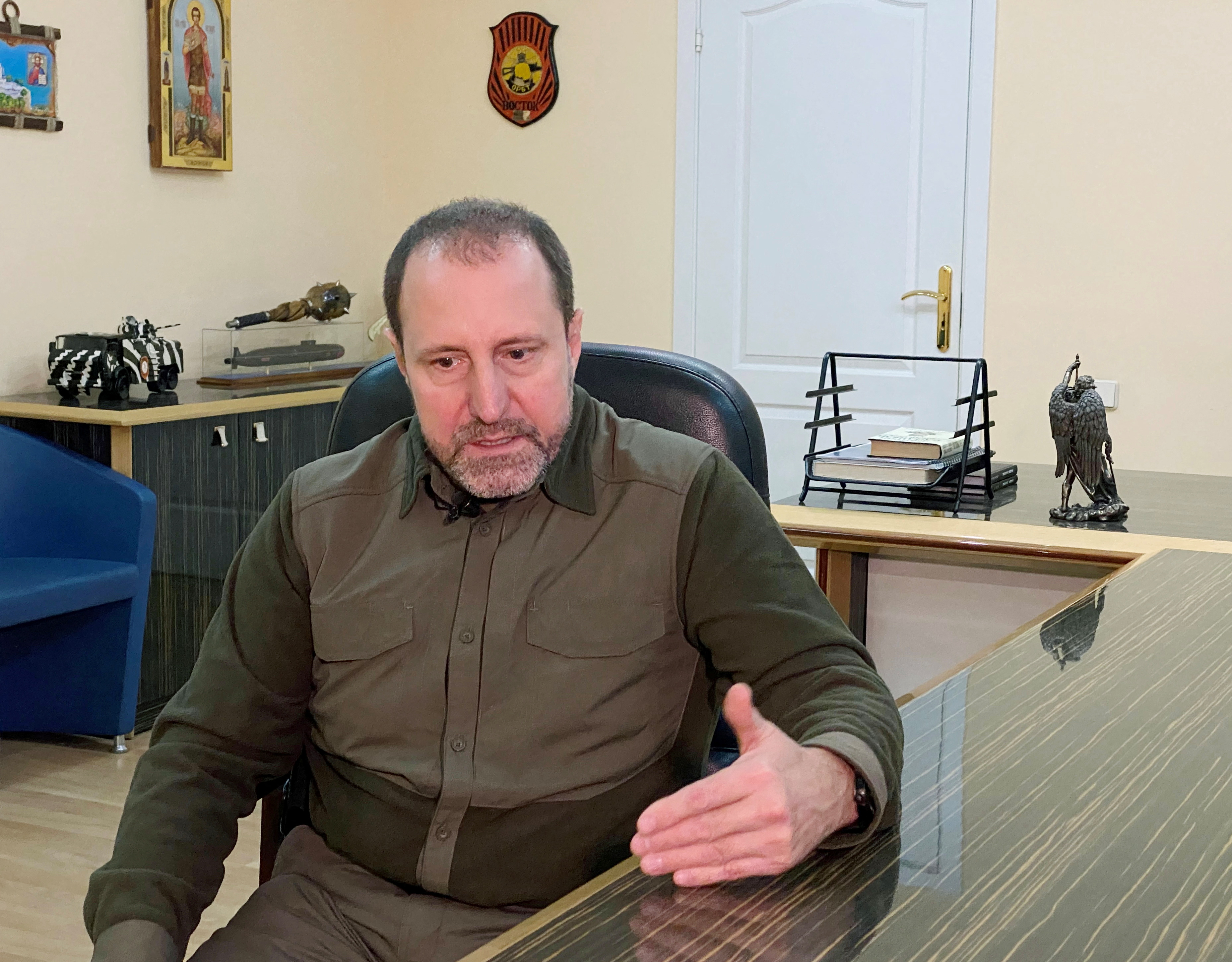Commander of the Vostok brigade Alexander Khodakovsky attends an interview in Donetsk
