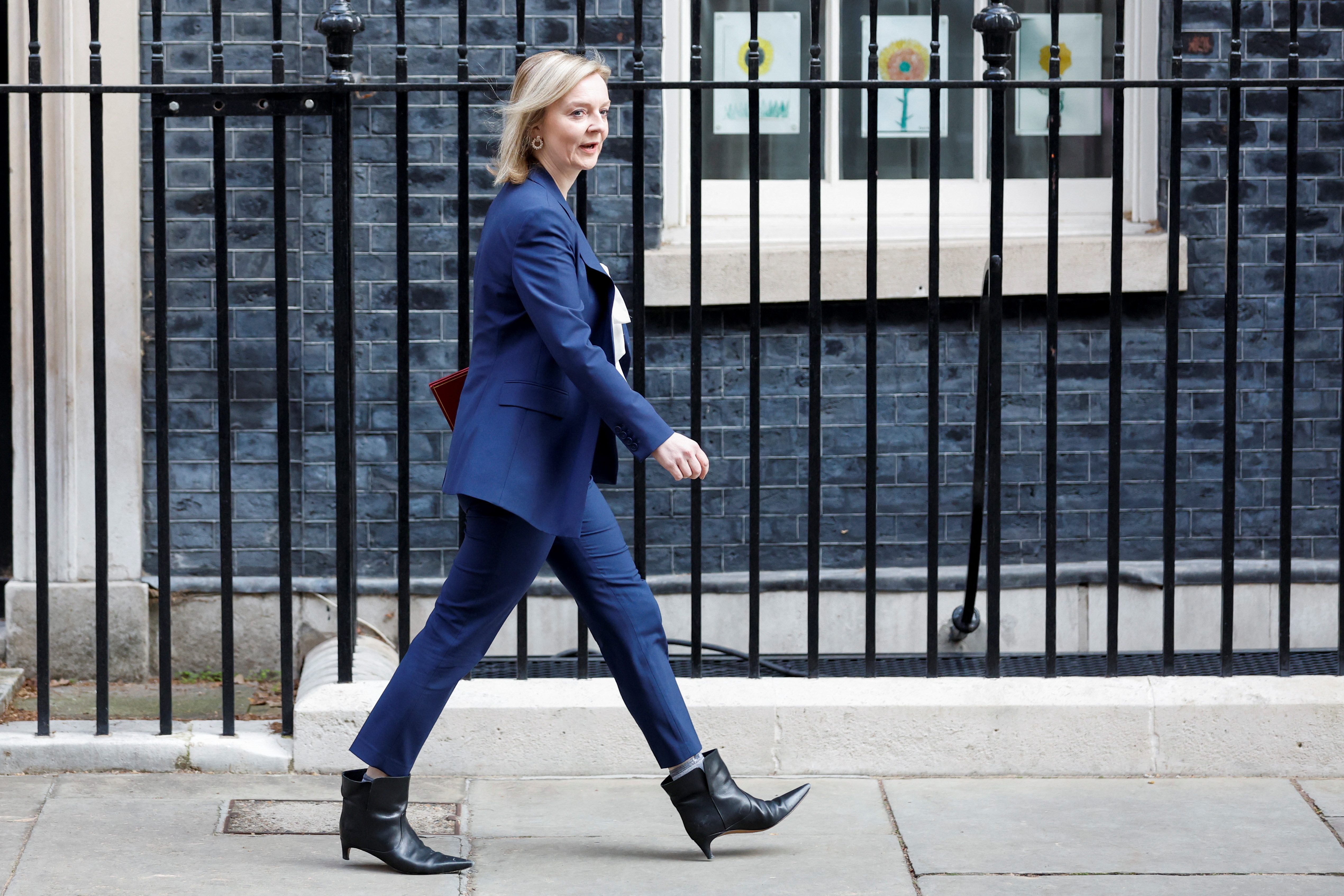 British Foreign Secretary Truss walks outside Downing Street