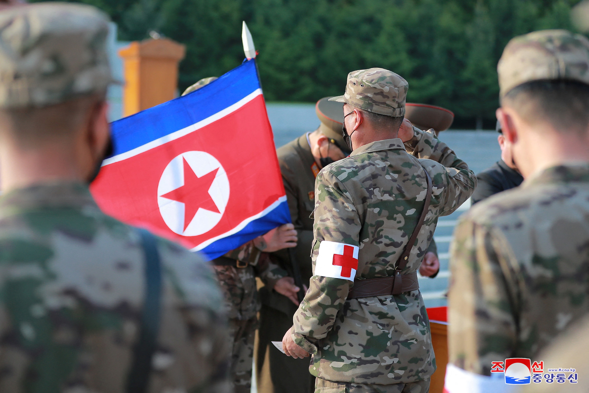 Military personnel from the Korean People's Army medical corps attend the launch of a campaign to improve the supply of medicines, amid the COVID-19 pandemic, in Pyongyang