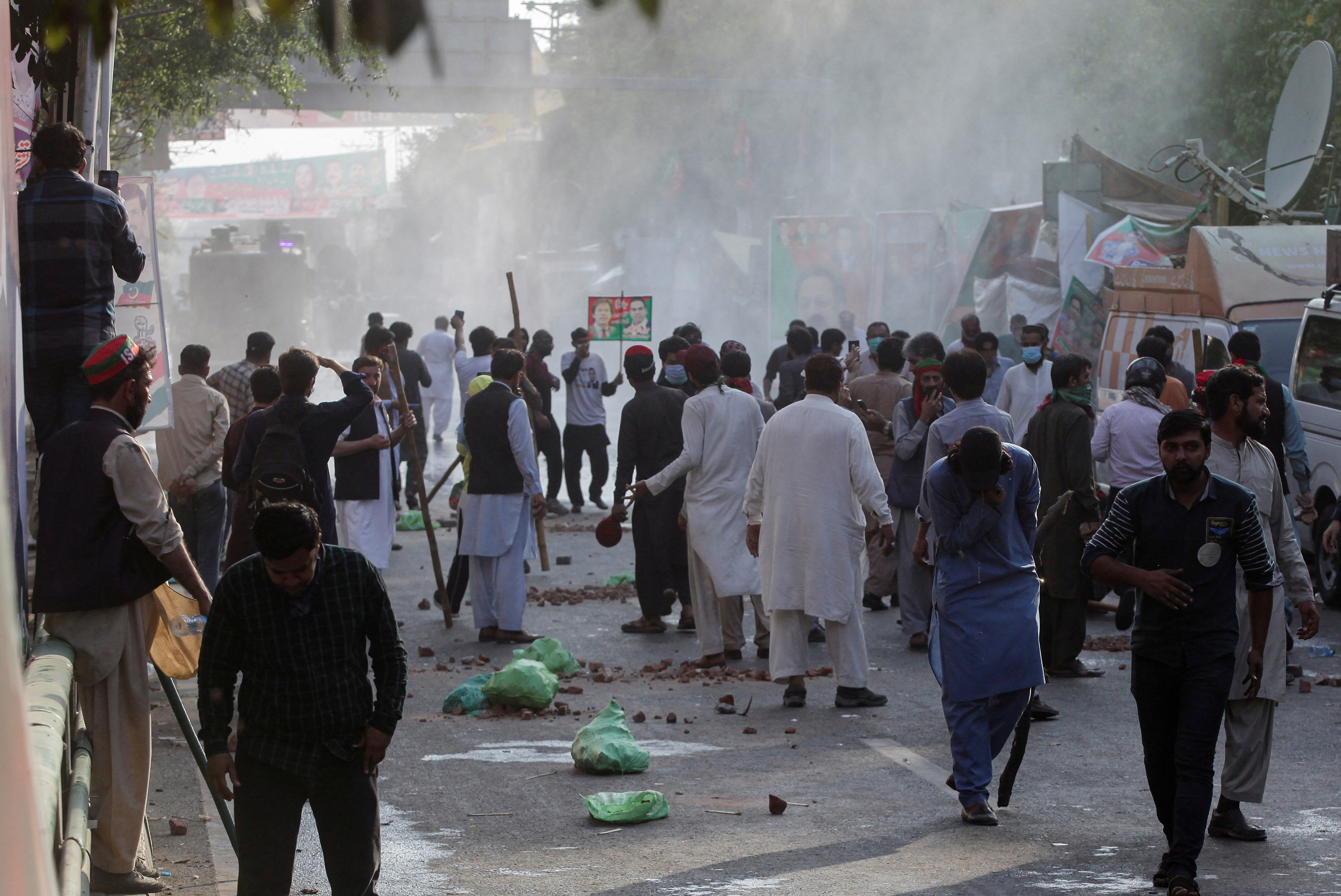 Supporters of former Pakistani PM Khan clashes with police ahead of his possible arrest, in Lahore
