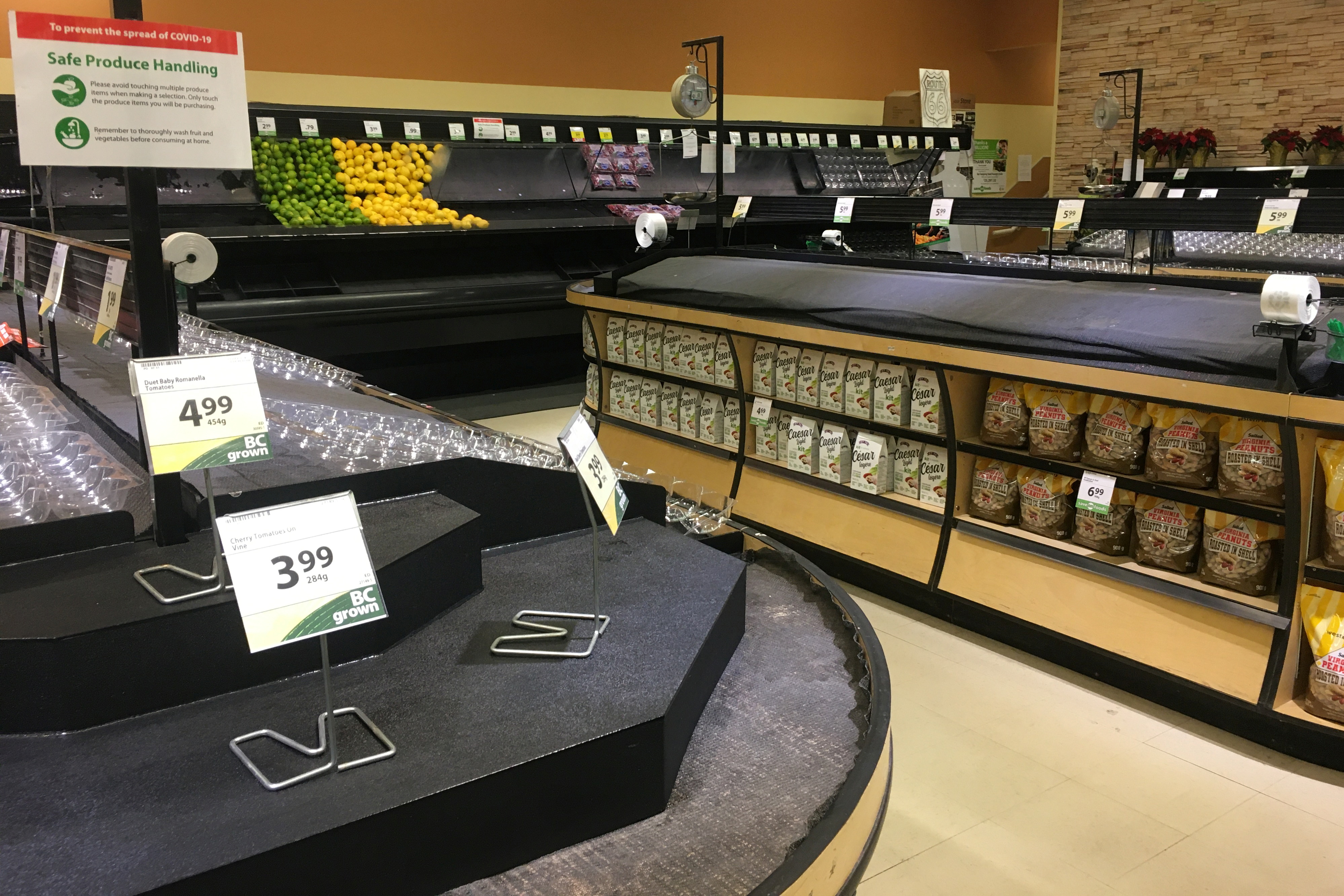 Produce shelves lie empty at the Save-On-Foods grocery store in Revelstoke
