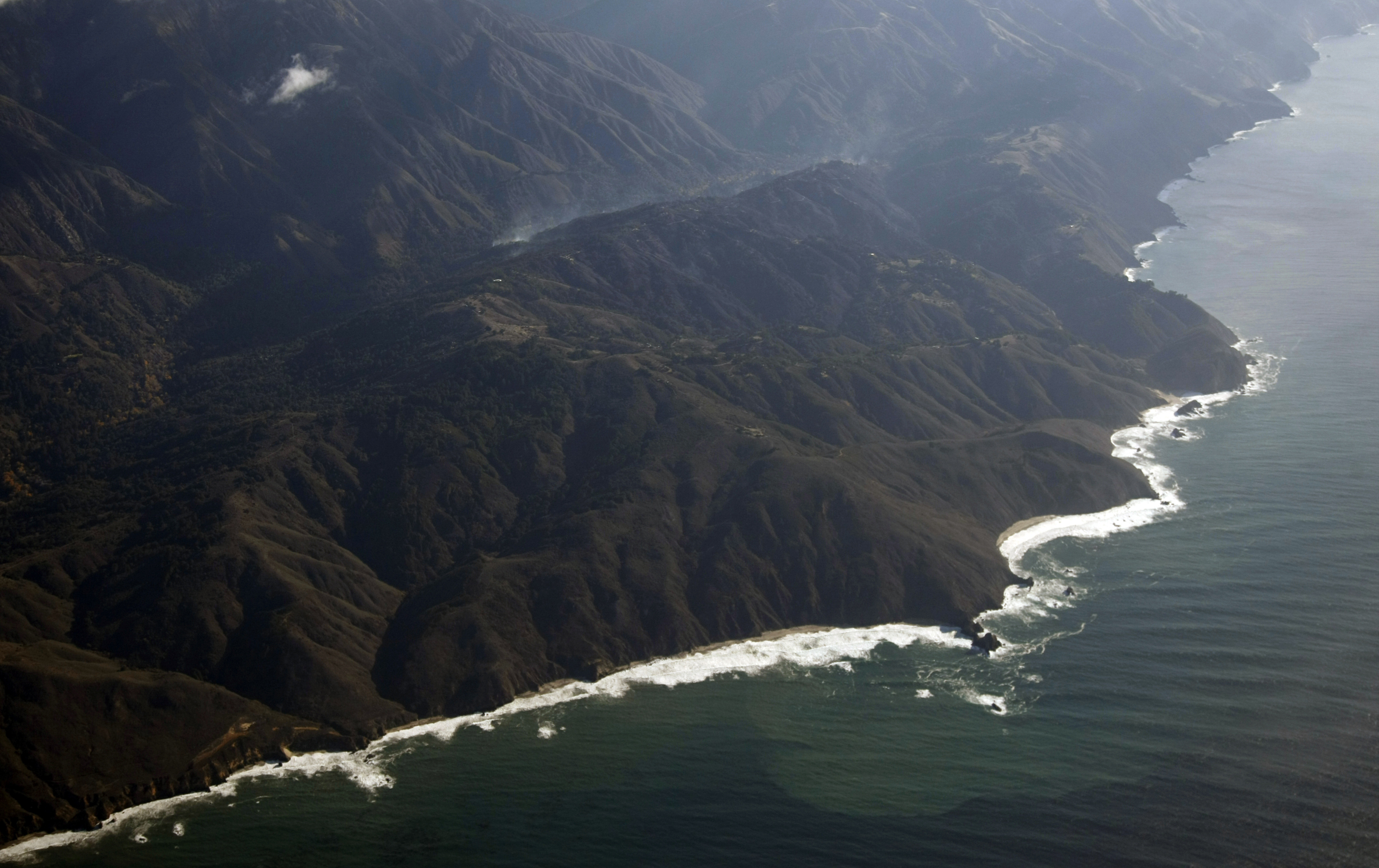 Aerial view shows smoke rising from a wildfire in Big Sur