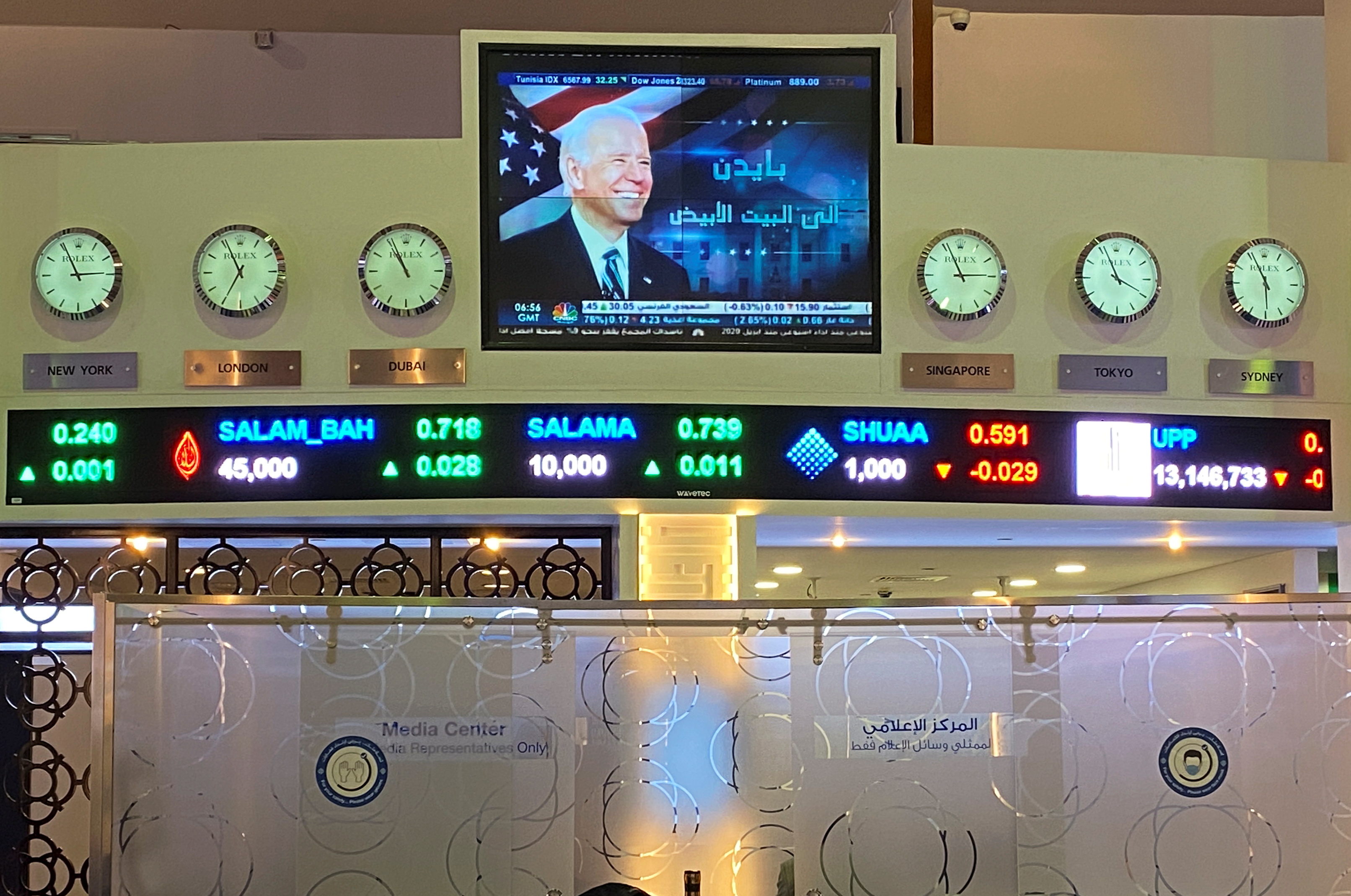 News of Joe Biden's victory in U.S. elections is aired on a digital screen in Dubai Stock Exchange in Dubai