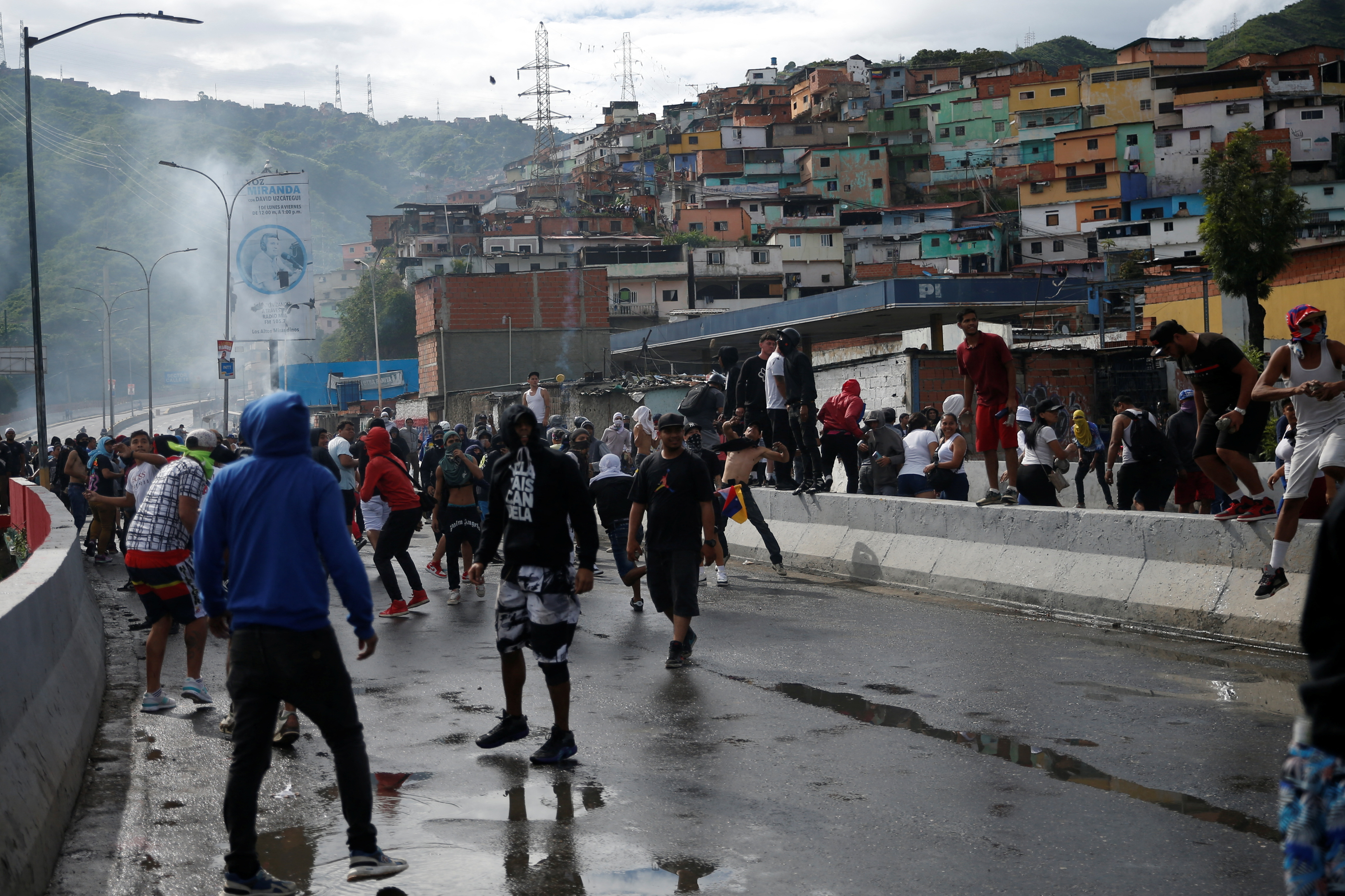 Supporters of Venezuelan opposition demonstrate following the announcement Venezuela's President Maduro won the presidential election, in Caracas