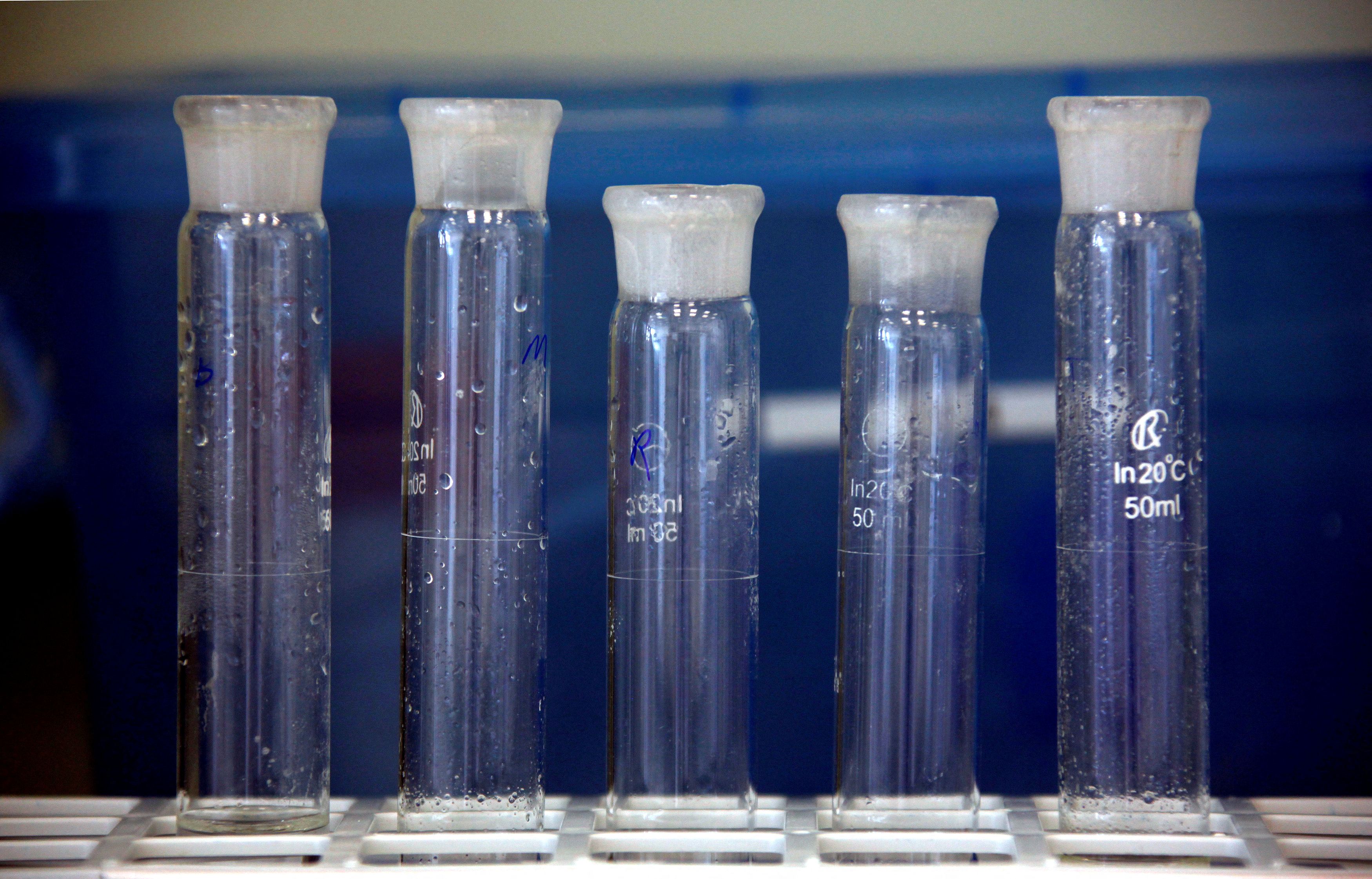 Containers are seen in a laboratory in an enzyme factory of Danish biopharmaceutical company Novozymes in Beijing