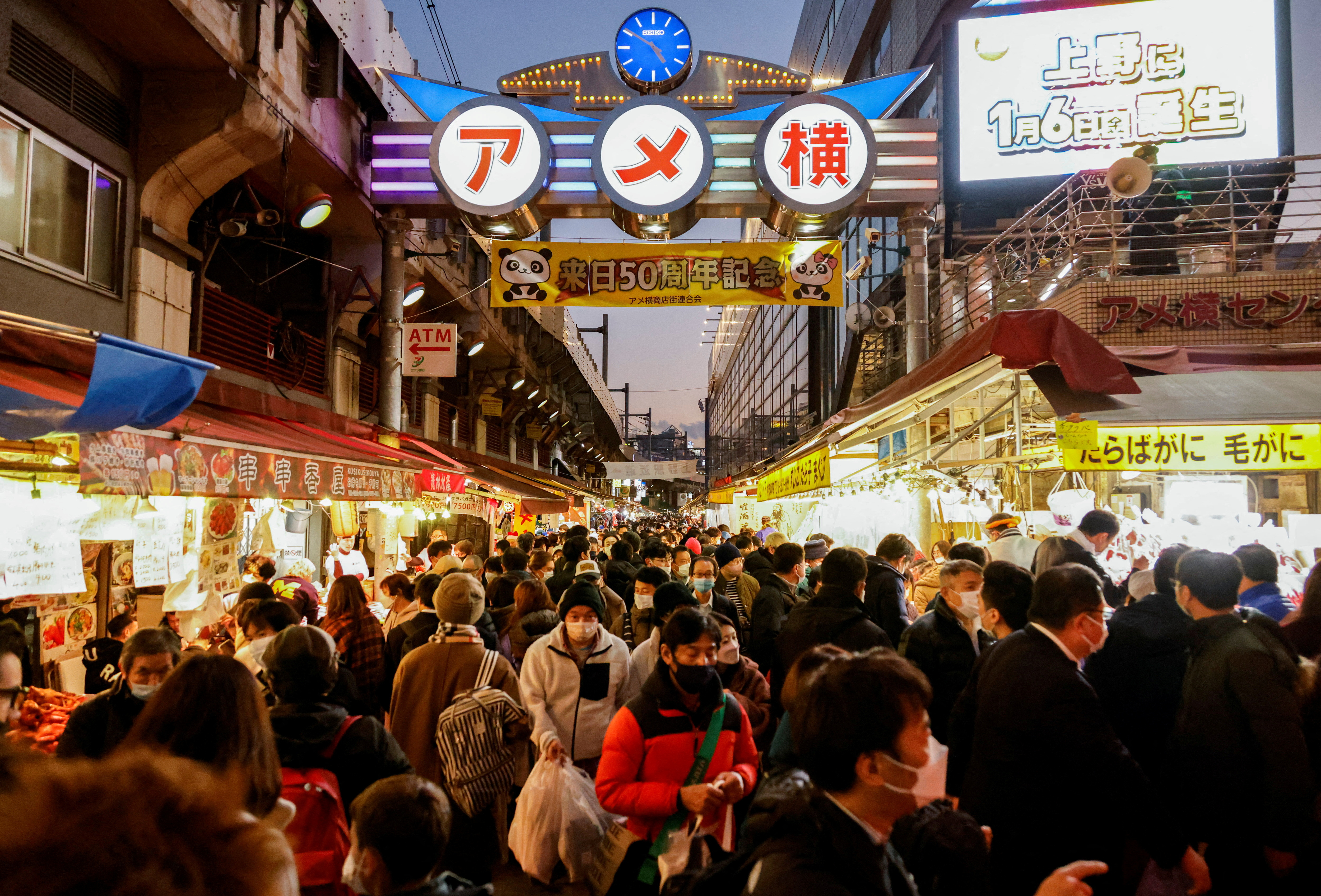 Japan's population falls while foreign residents rise to record