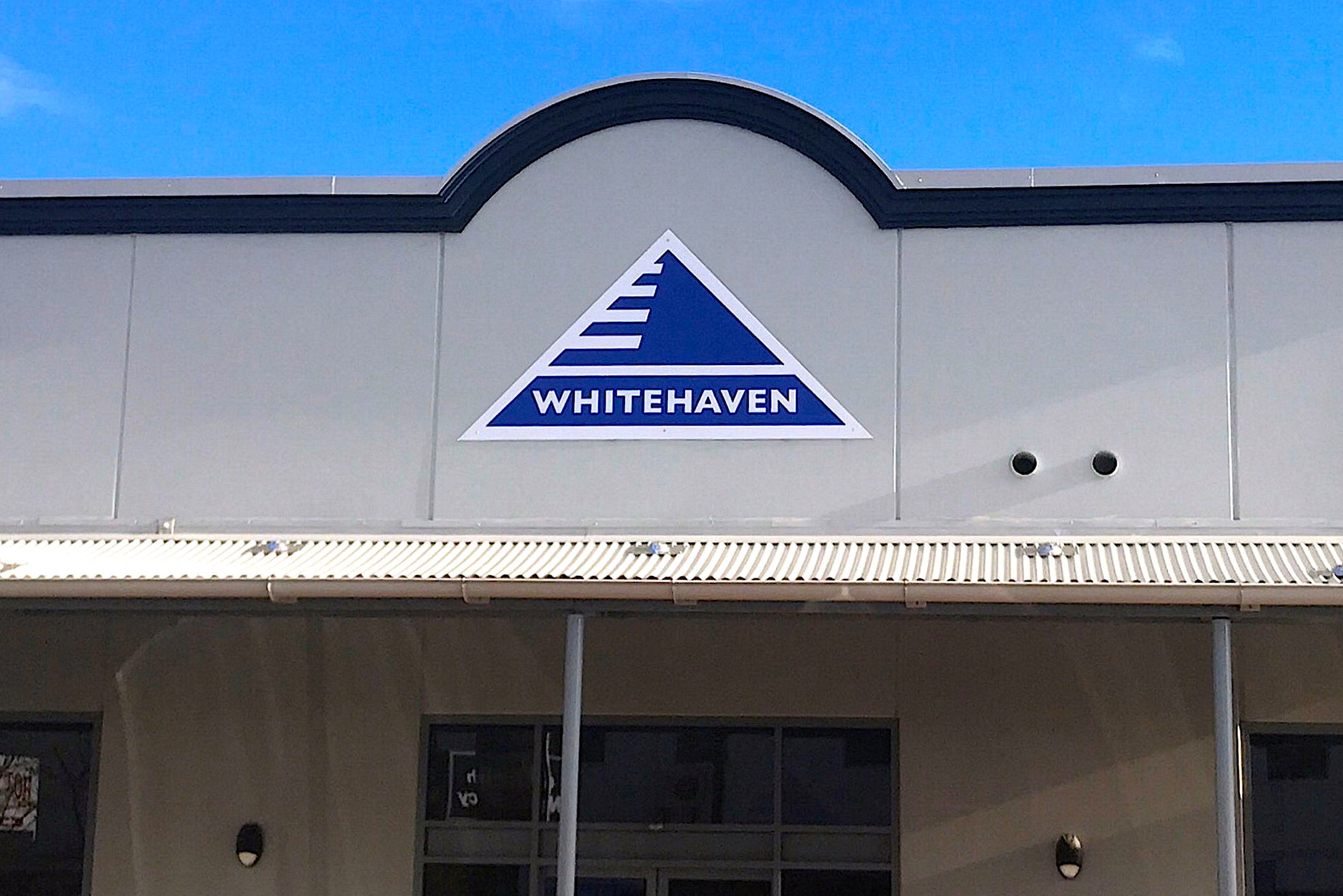 The logo of Australia's biggest independent coal miner Whitehaven Coal Ltd is displayed on their office building located in Gunnedah