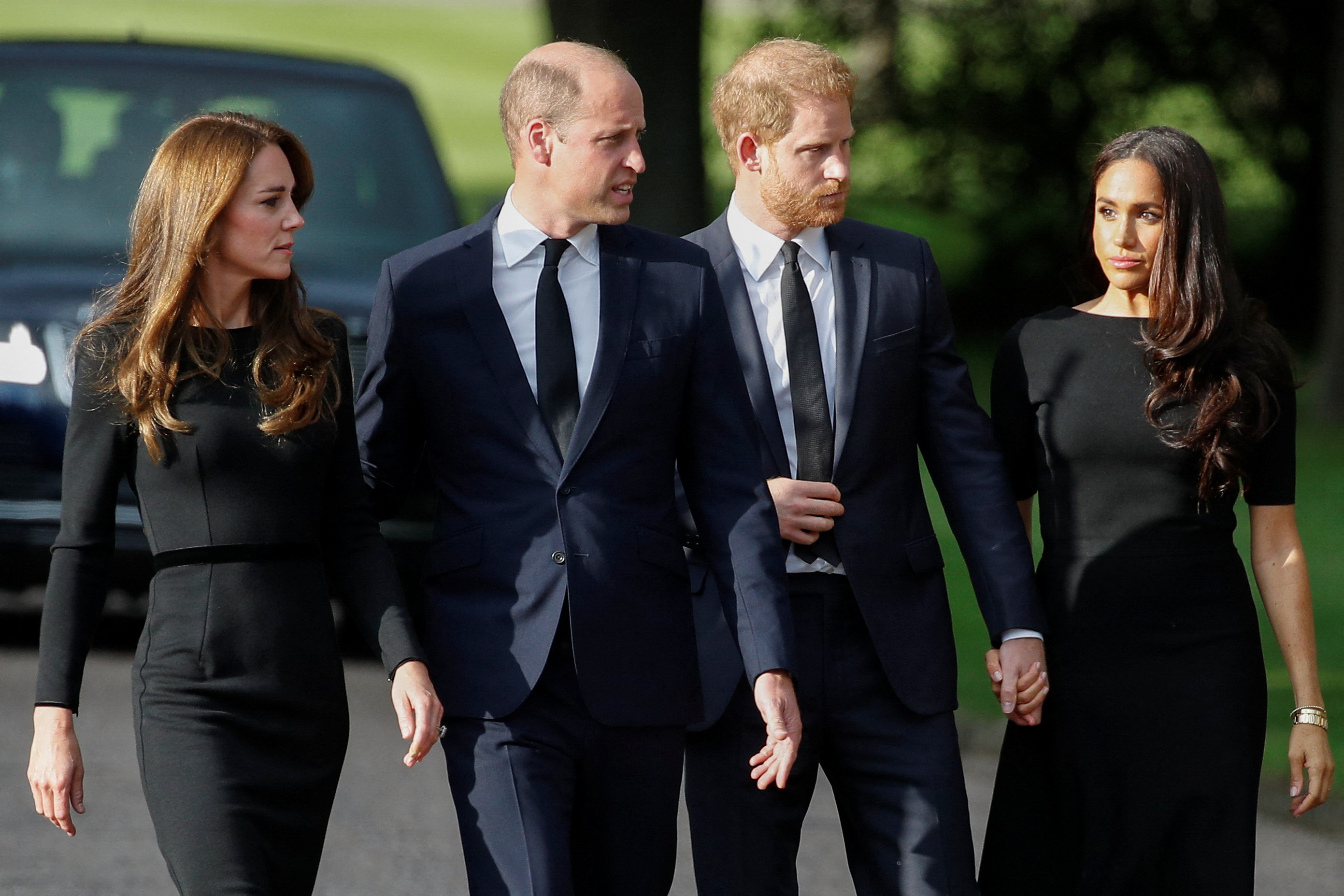 Prince Harry, Meghan join William and Kate on Windsor walkabout | Reuters