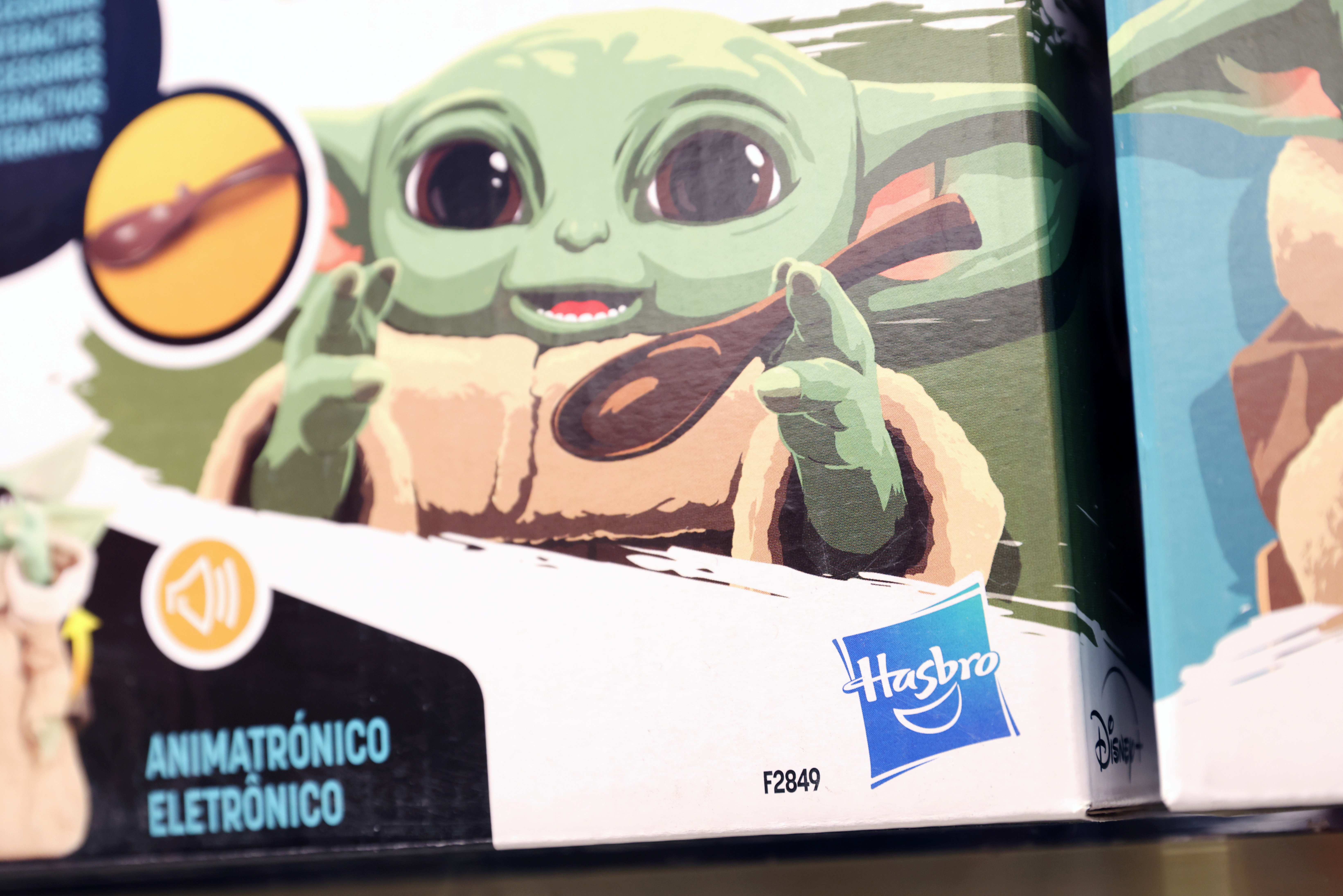 The Hasbro, Inc. logo is seen on the Star Wars Galactic Snackin Grogu toy in the FAO Schwarz toy store in Manhattan, New York City