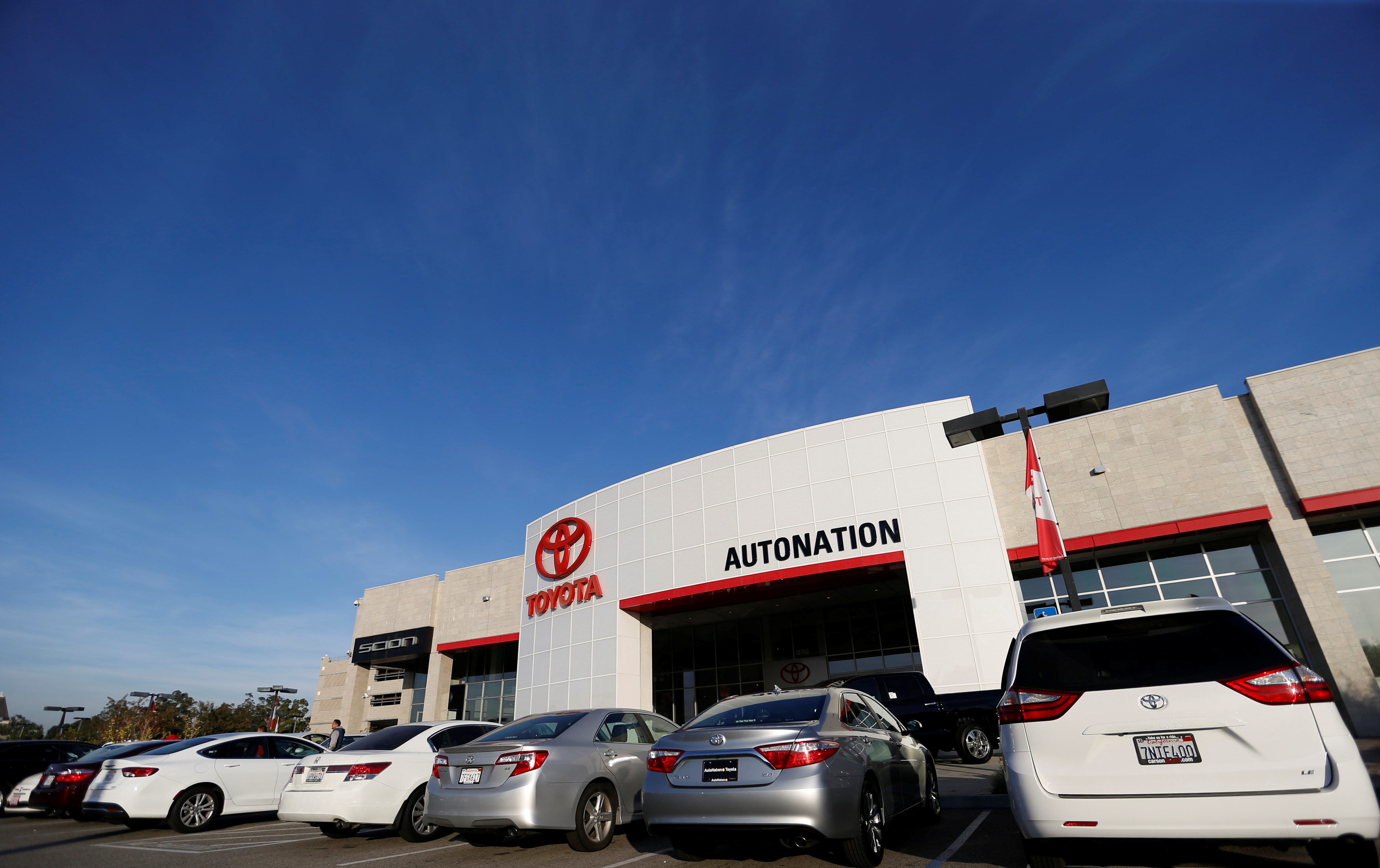FILE PHOTO: Vehicles for sale are pictured on the lot at AutoNation Toyota dealership in Cerritos, California December 9, 2015.   REUTERS/Mario Anzuoni/File Photo