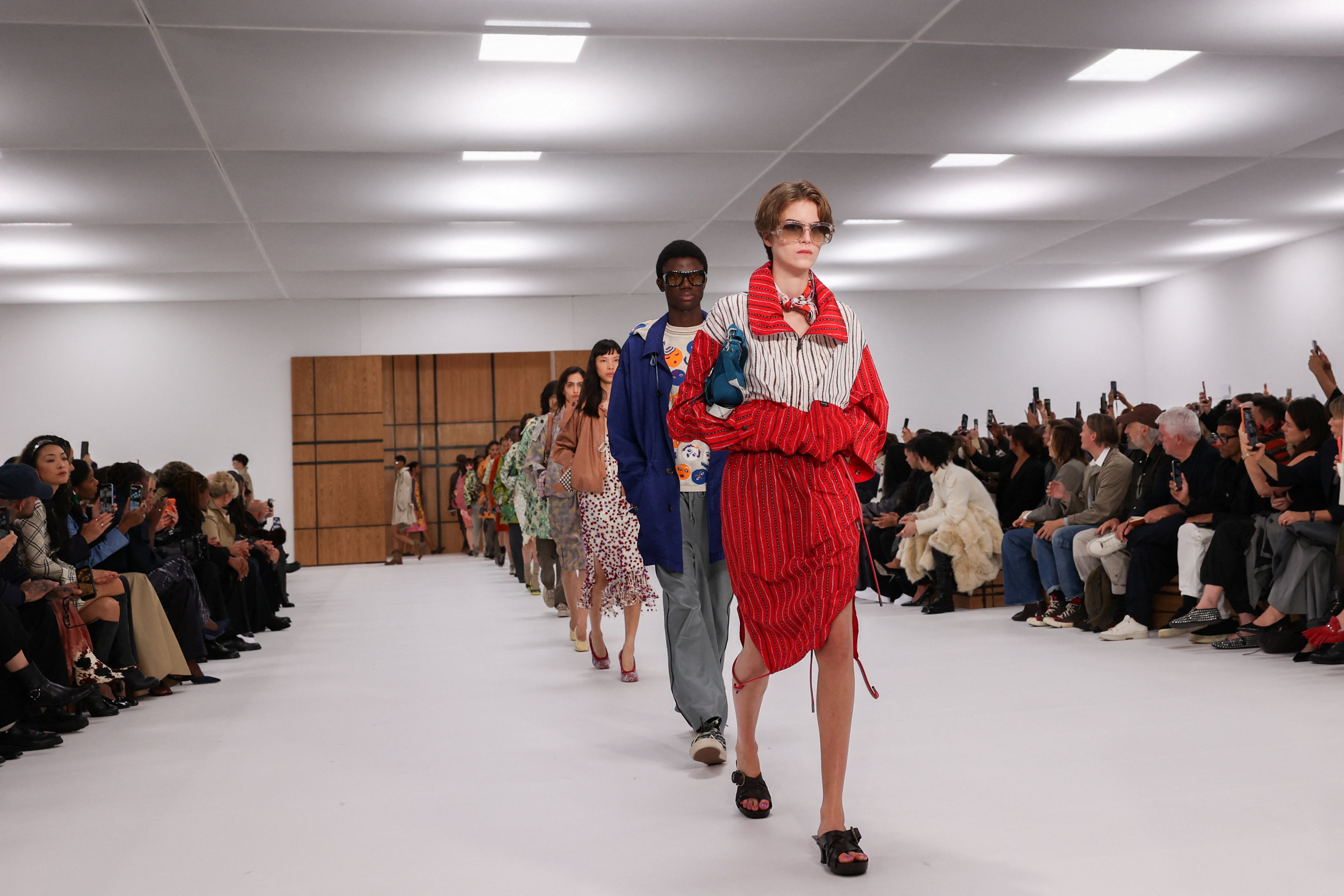 Burberry shows embroidered trench coats and flowery skirt suits
