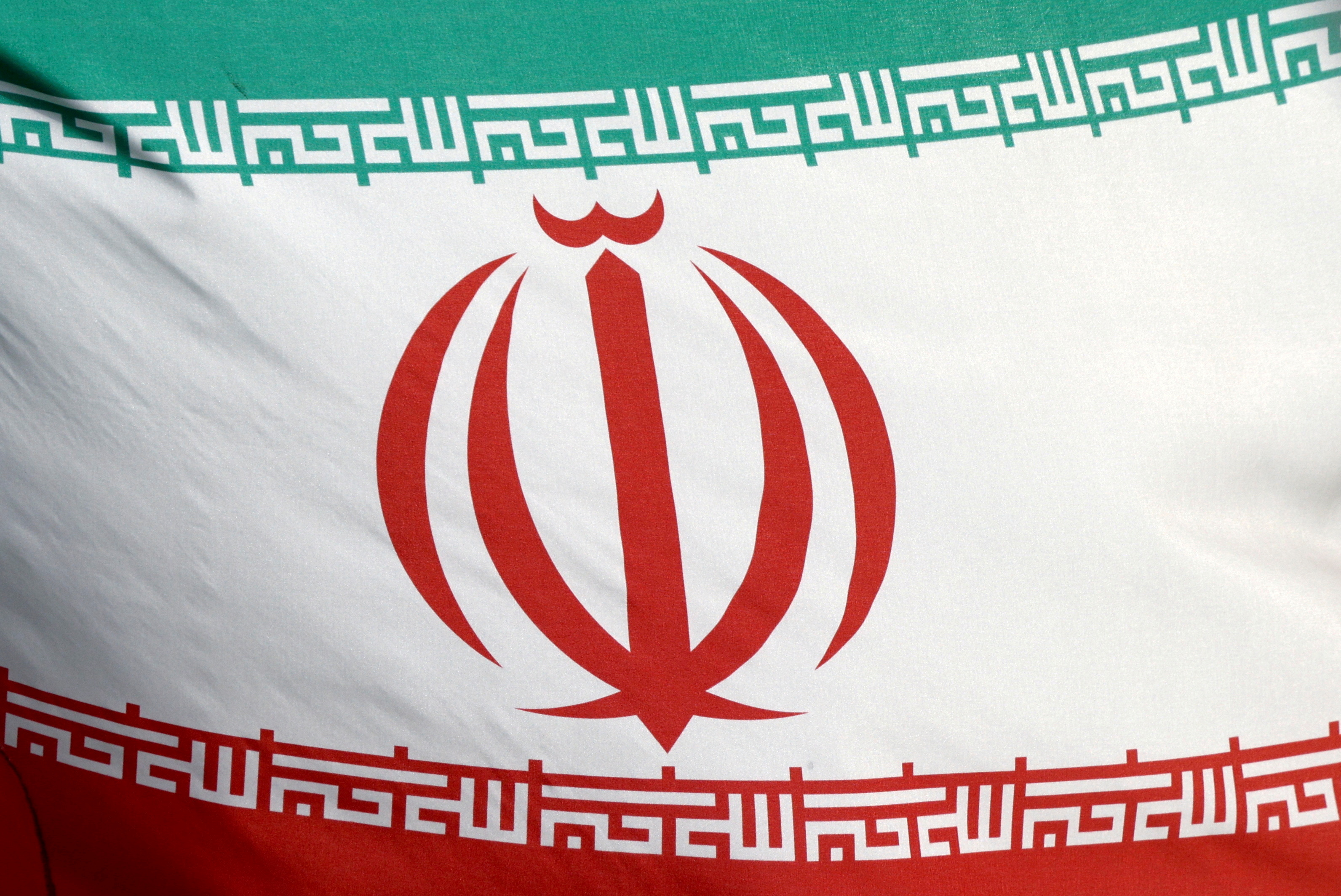 FILE PHOTO: The Iranian flag flies in front of the IAEA headquarters in Vienna