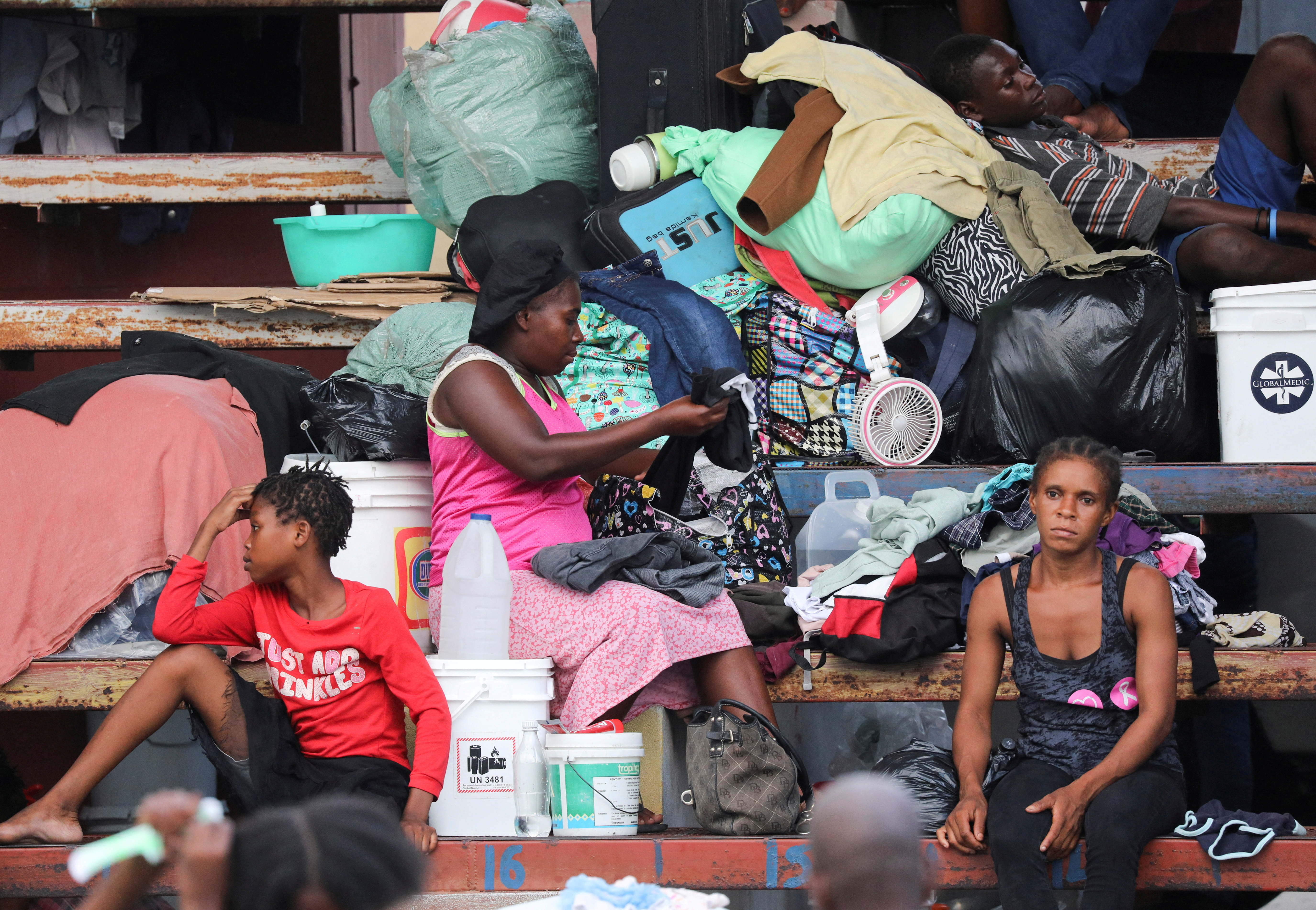 Haitians fleeing gang violence find shelter in a sport arena, in Port-au-Prince