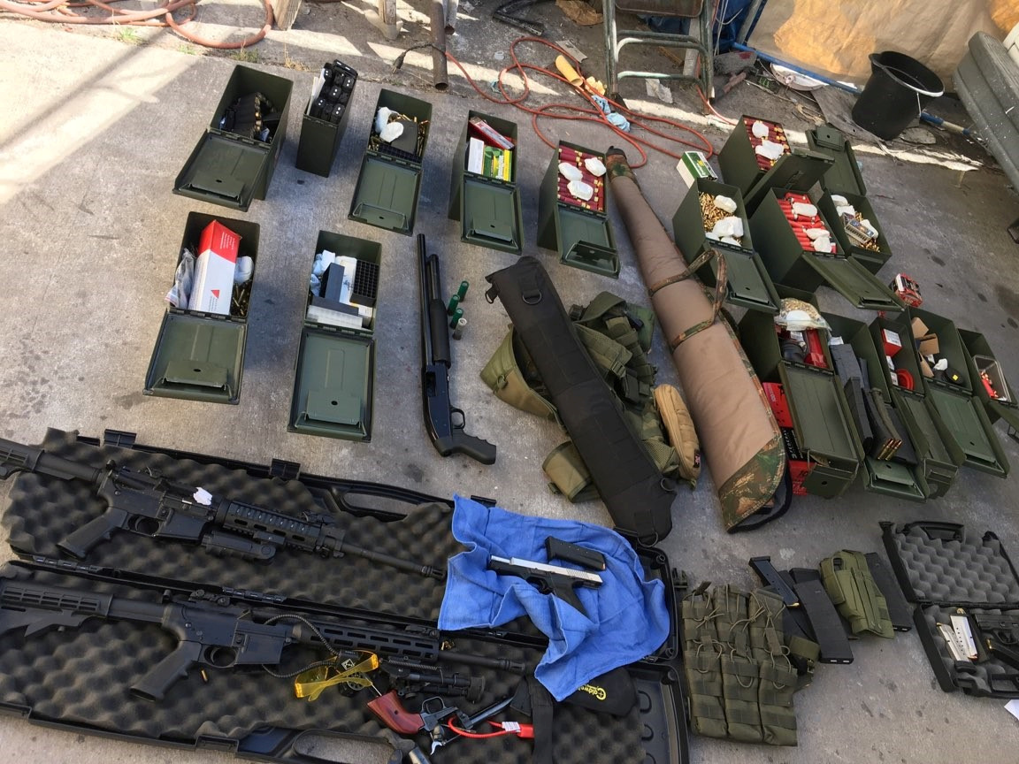 Long Beach Police Department photo of illegal high-capacity magazines and an assault rifle