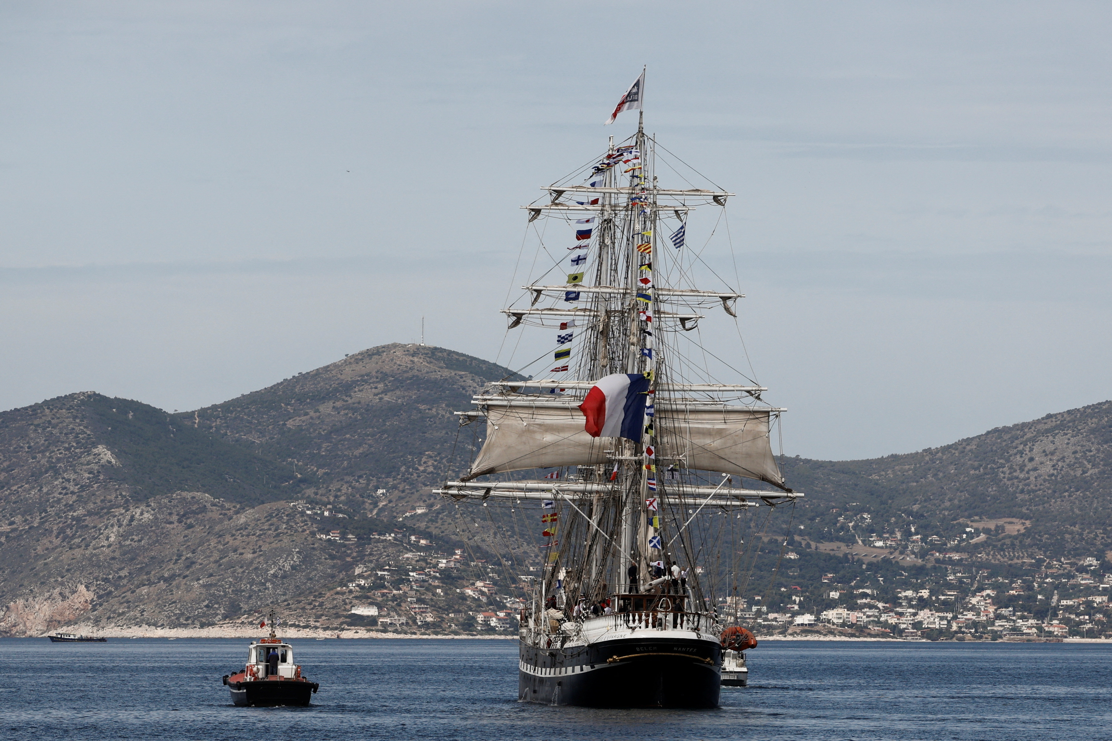 The Olympic flame departs Greece on the sailing ship Belem for the 2024 Paris Games