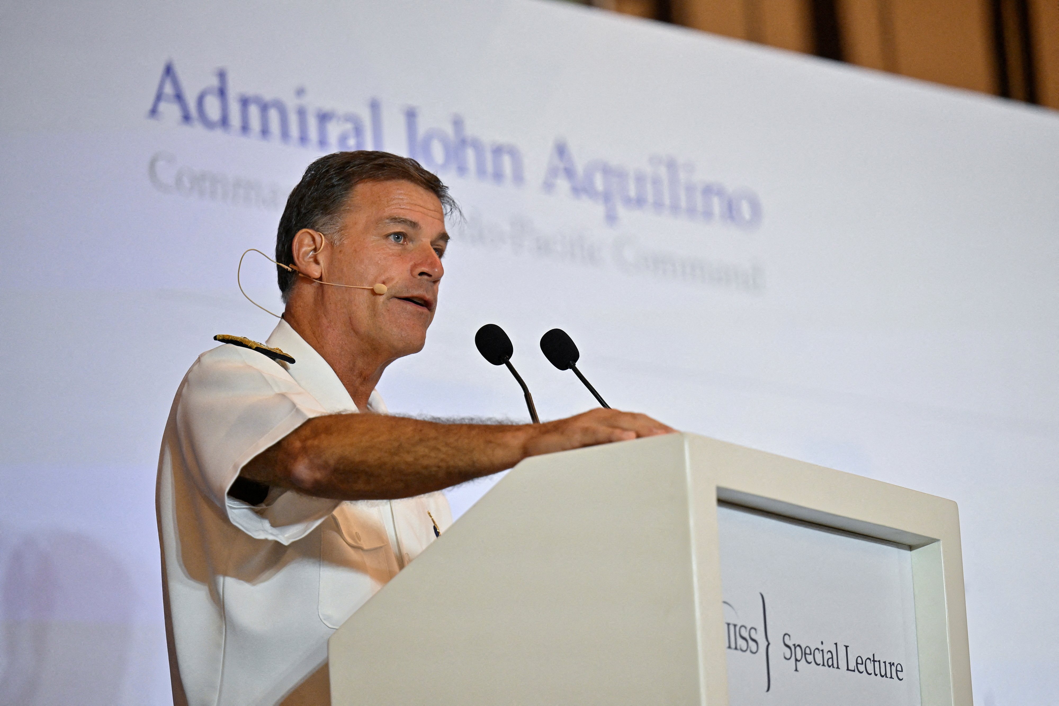 Admiral John C. Aquilino, Commander of the United States Indo-Pacific Command speaks at the IISS Special Lecture in Singapore