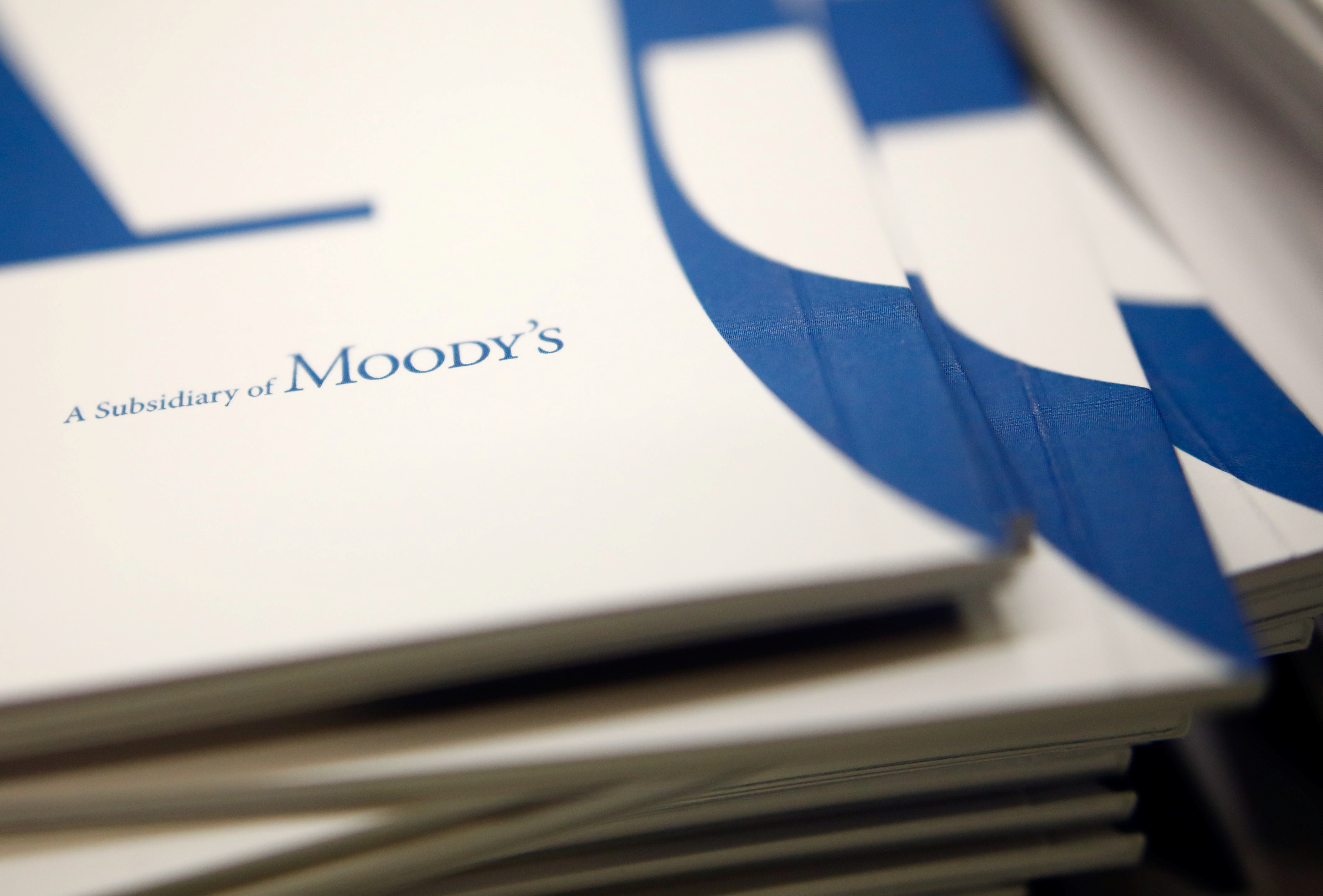 Booklets are seen during a conference of Midroog, the Israeli affiliate of Moody's Investors Service, in Tel Aviv
