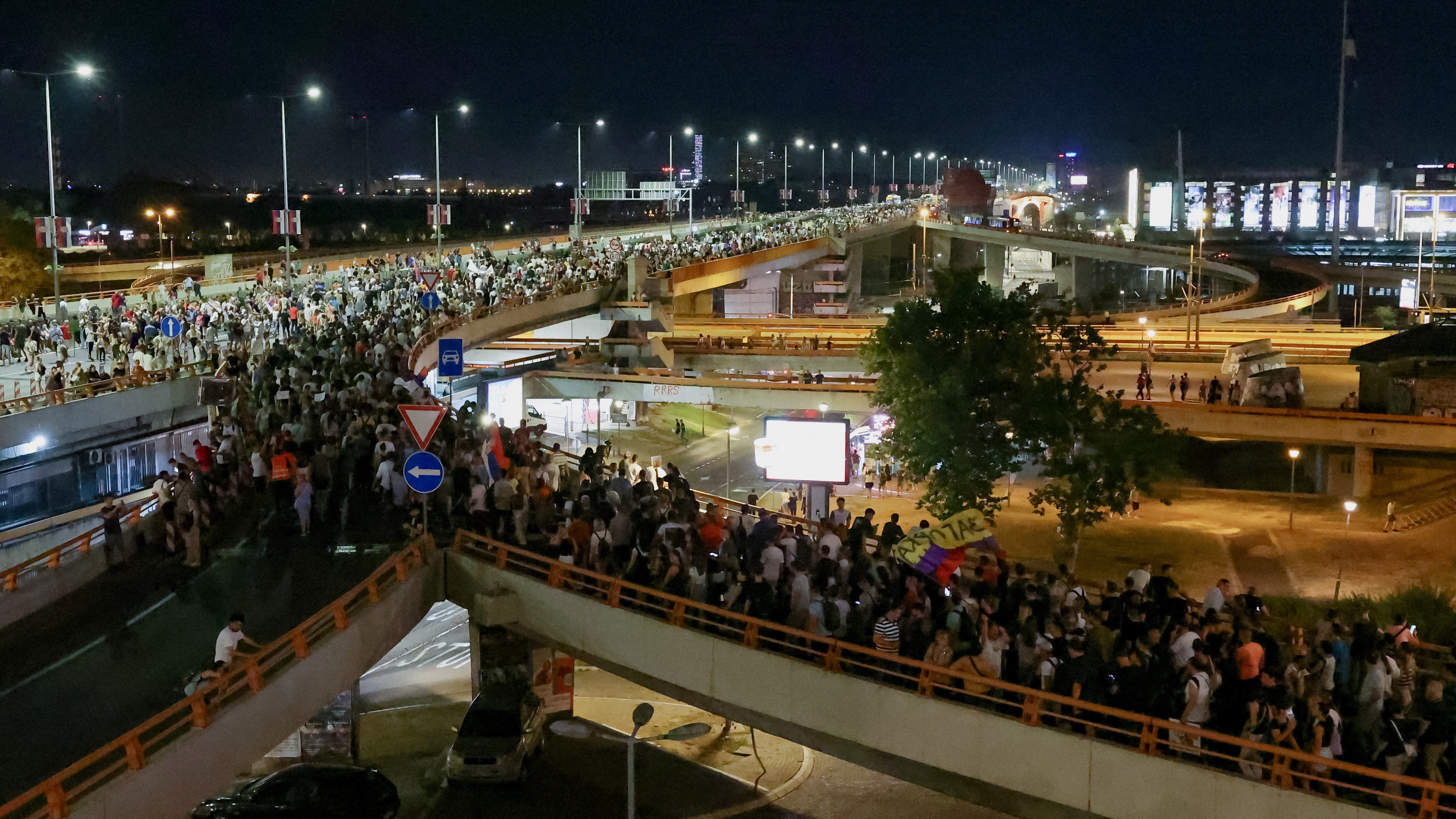 People attend a protest against Rio Tinto's lithium mining project, in Belgrade