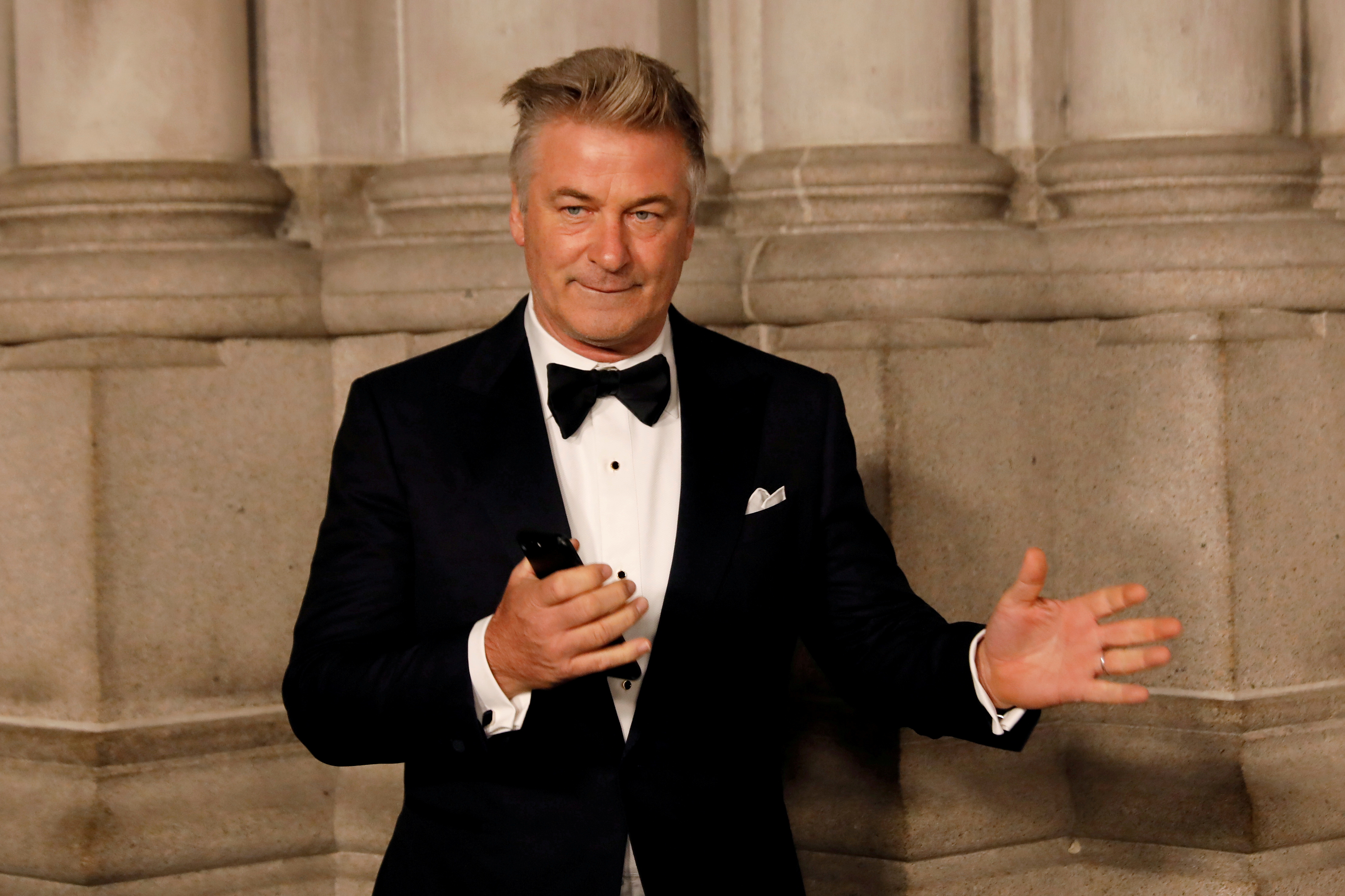 Actor Alec Baldwin gestures before walking on the red carpet during the commemoration of the Elton John AIDS Foundation 25th year fall gala at the Cathedral of St. John the Divine in New York City, in New York, U.S. November 7, 2017. REUTERS/Shannon Stapleton