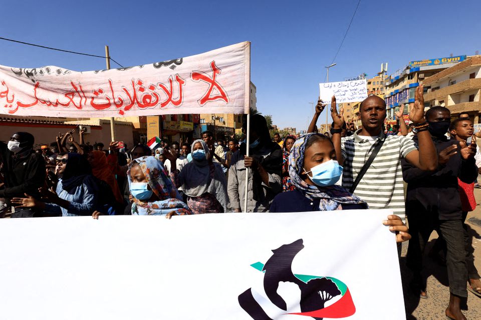 Protesters march during a rally against military rule, following last month's coup in Khartoum North, Sudan. 
REUTERS/Mohamed Nureldin Abdallah