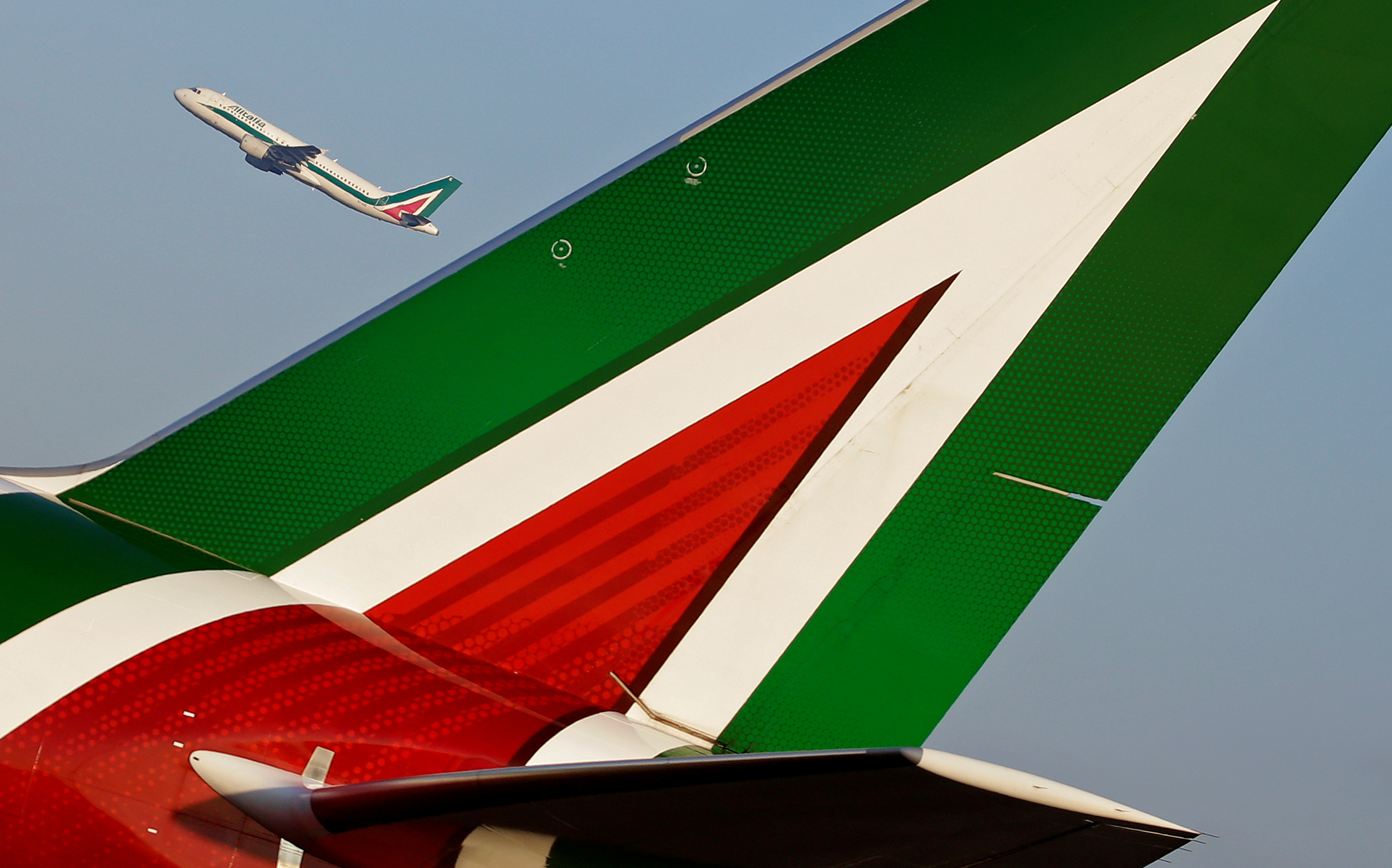 An Alitalia Airbus A320 passenger aircraft takes off at Fiumicino International Airport in Rome