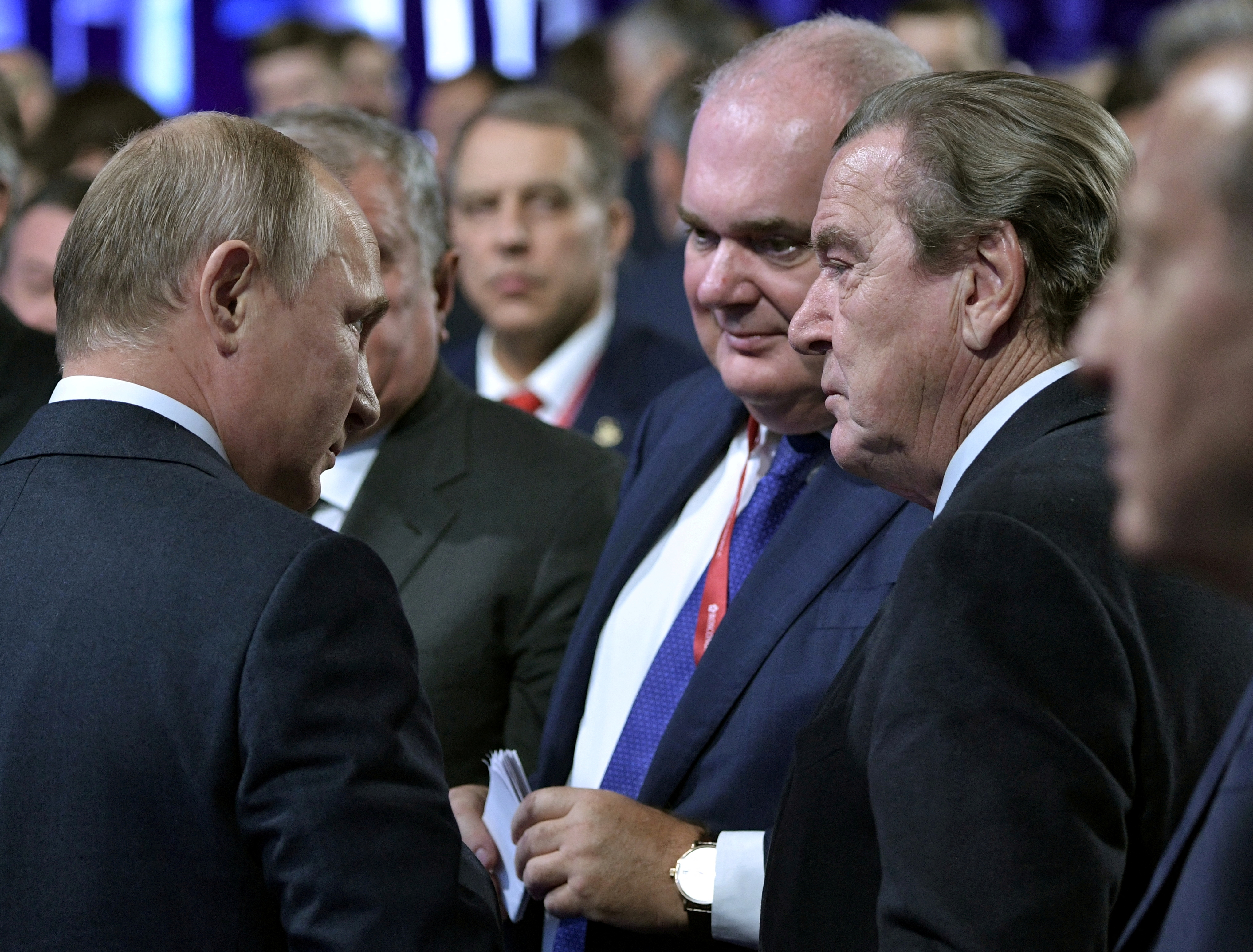 Russian President Putin and former German Chancellor Schroeder, chairman of the shareholders’ committee at Nord Stream AG, attend the Energy Week International Forum in Moscow