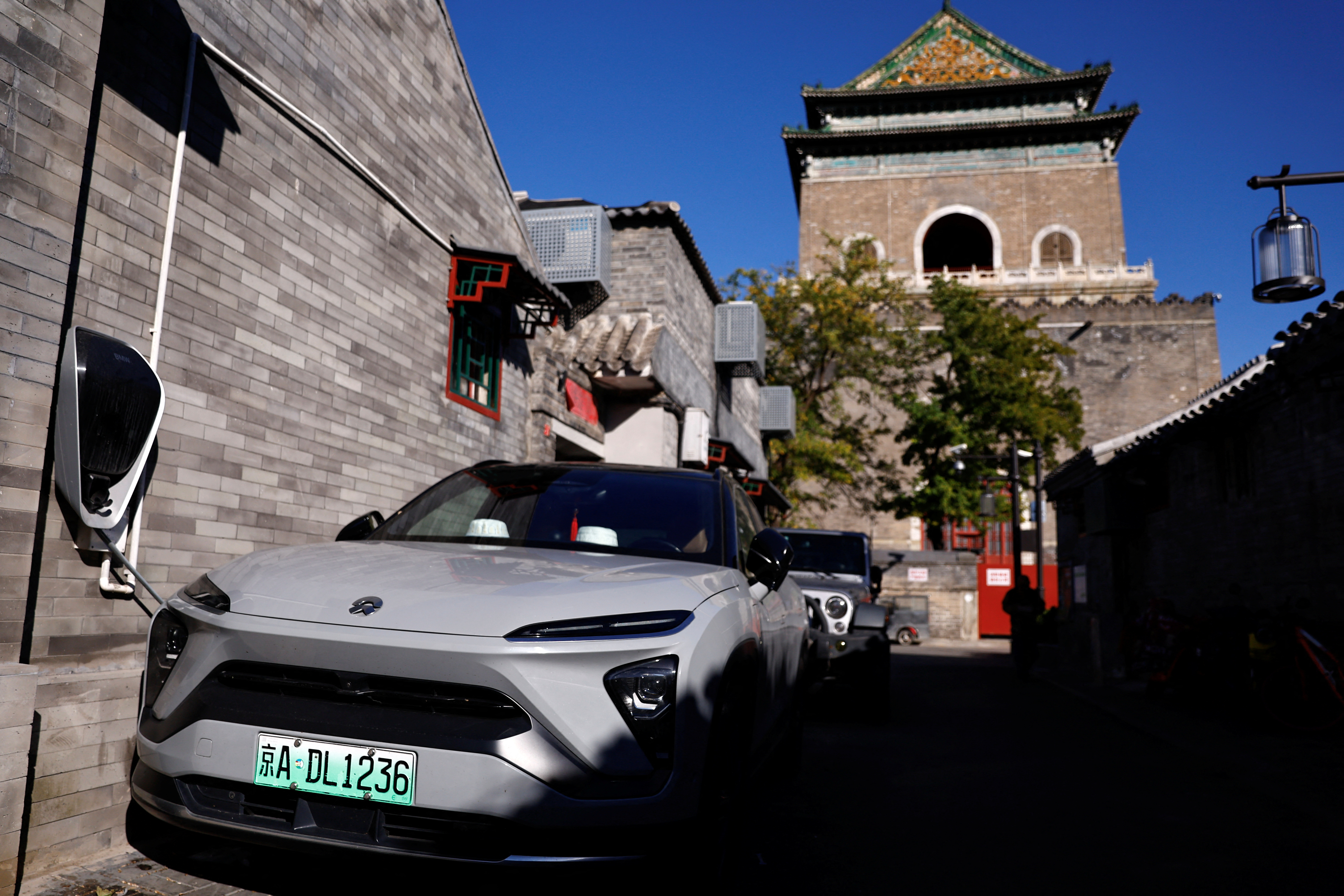 Nio's electric vehicle (EV) is parked near the Bell Tower in Beijing
