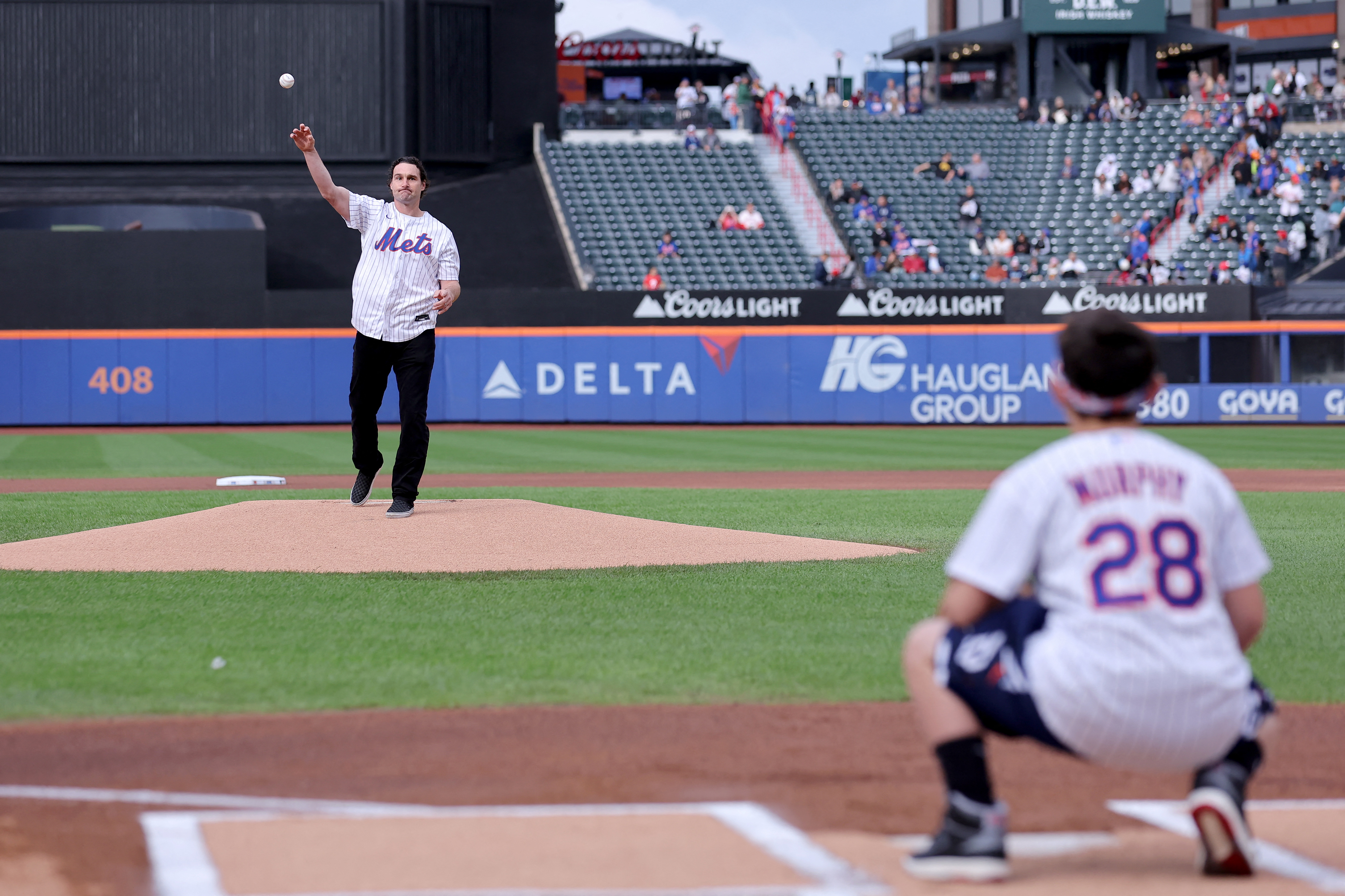 FLUSHING, NY - AUGUST 28: New York Mets Pitcher Tylor Megill (38) delivers  a pitch during the first inning of.a Major League Baseball game between the  Texas Rangers and the New York