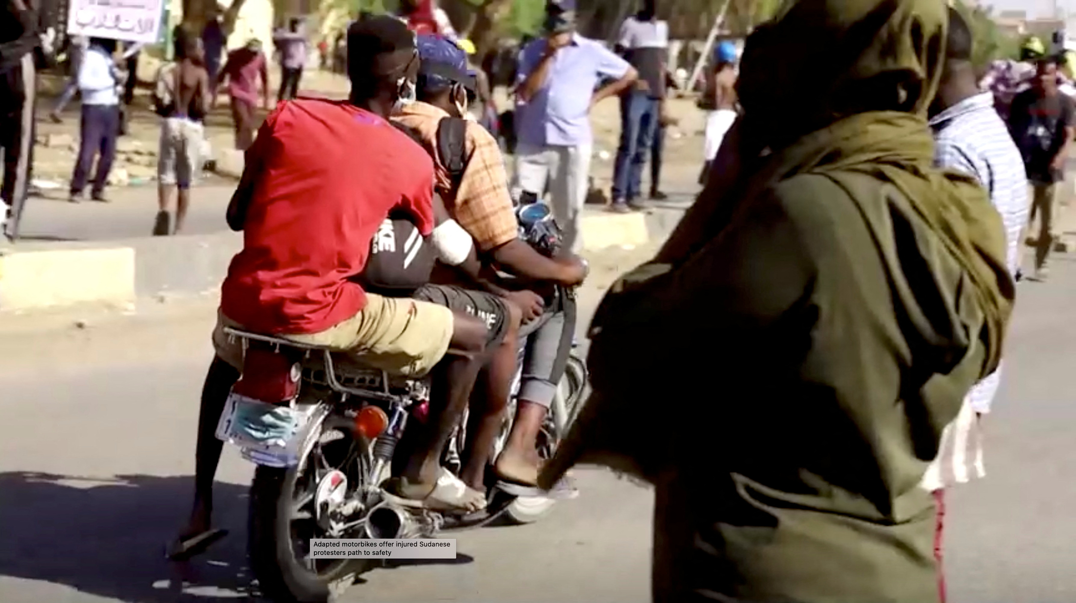 Adapted motorbikes offer injured Sudanese protesters path to safety in Khartoum