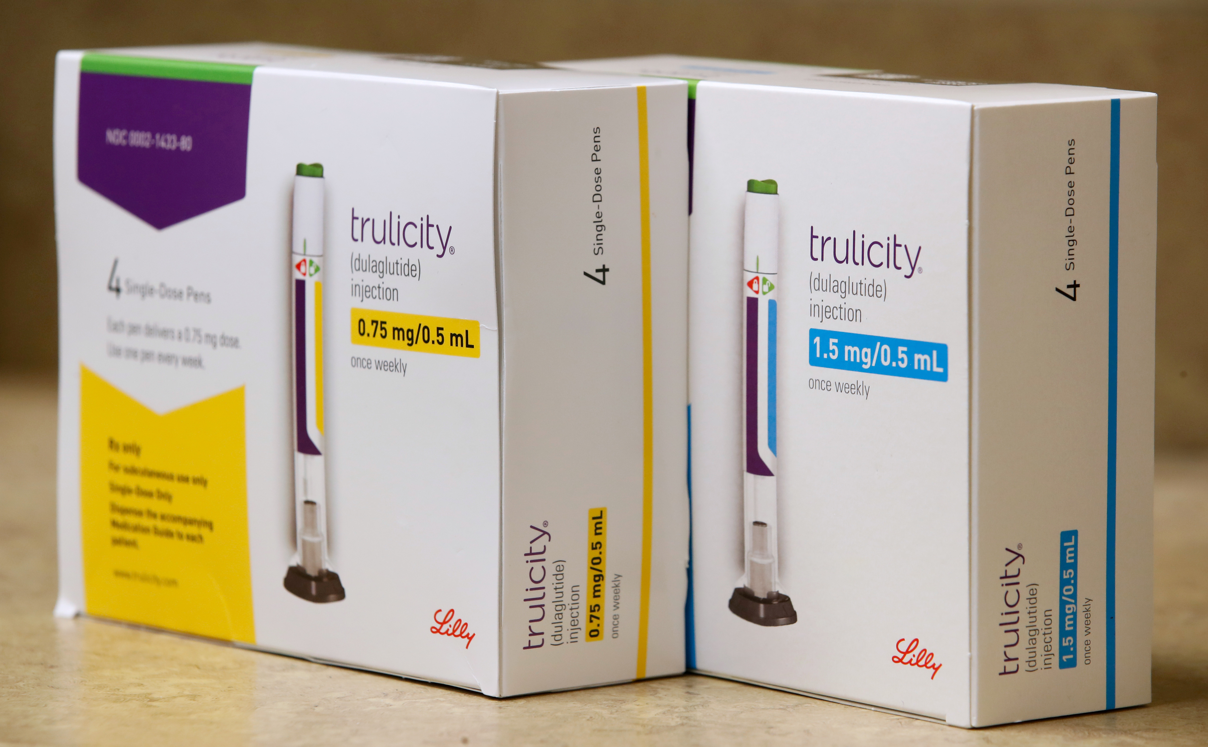 Boxes of the drug trulicity, made by Eli Lilly and Company, sit on a counter at a pharmacy in Provo