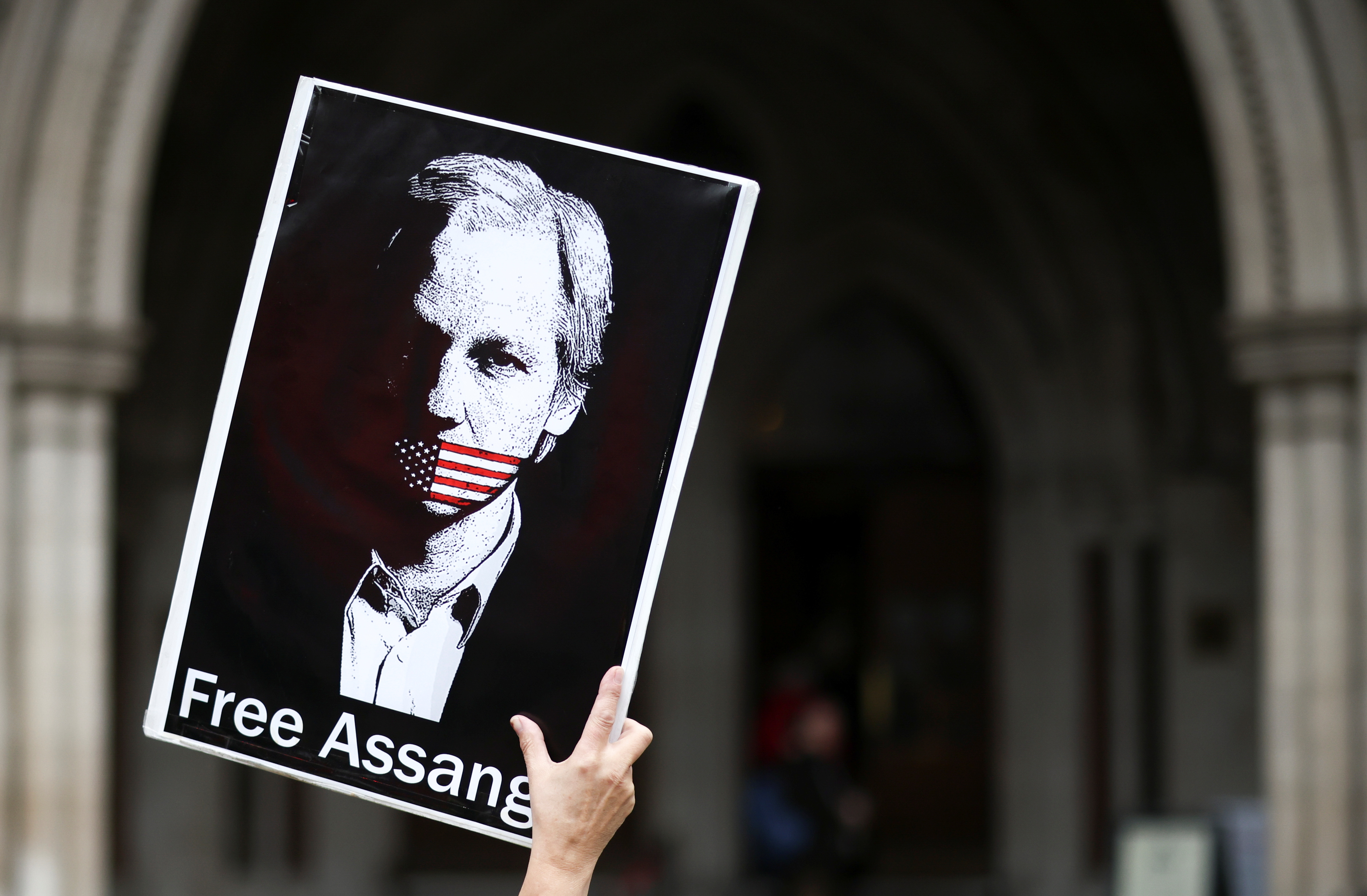 Supporters of Wikileaks founder Julian Assange protest in London