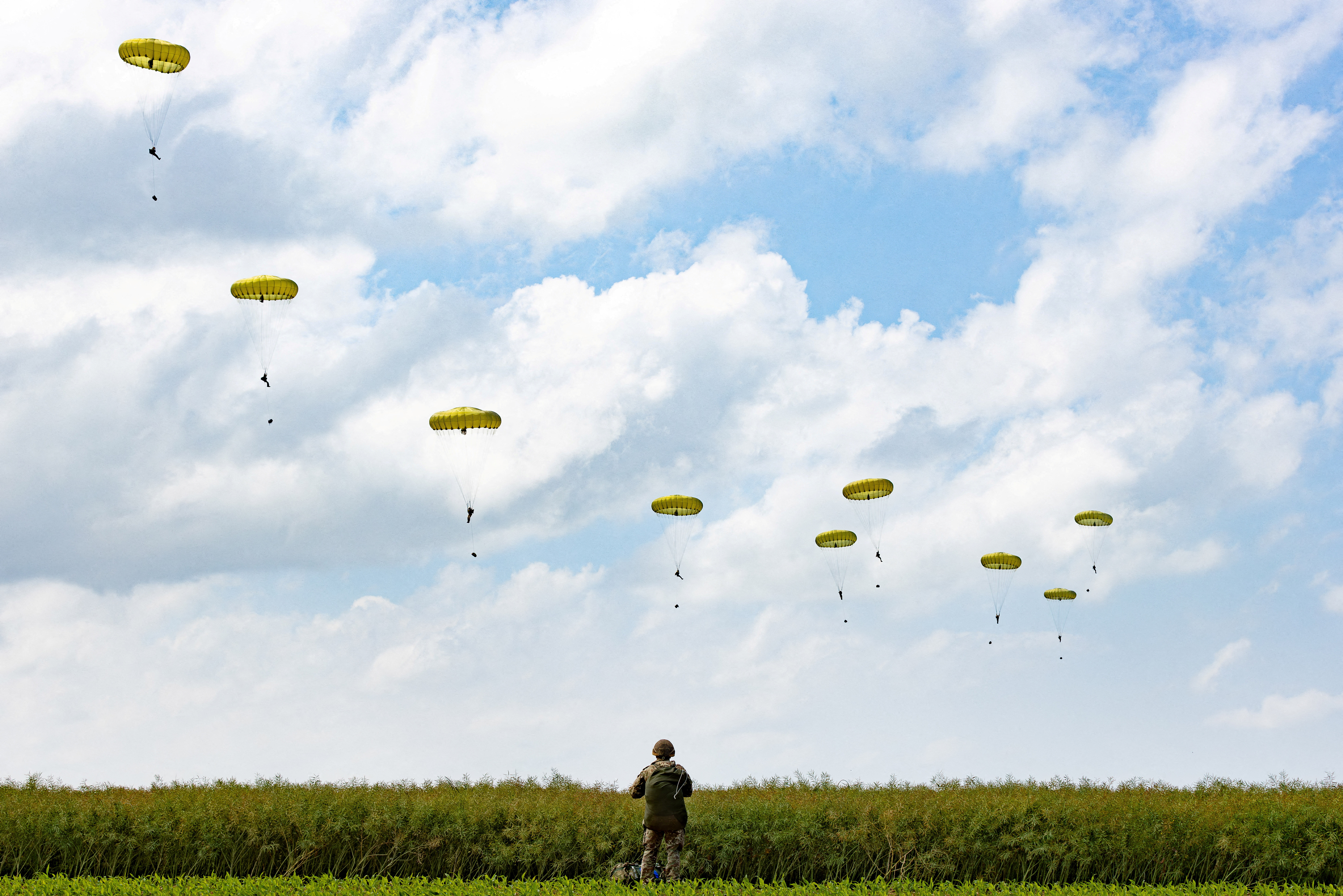 Paratroopers jump into Normandy to pay tribute to the soldiers who parachuted in on D-Day in Sannerville, Normandy
