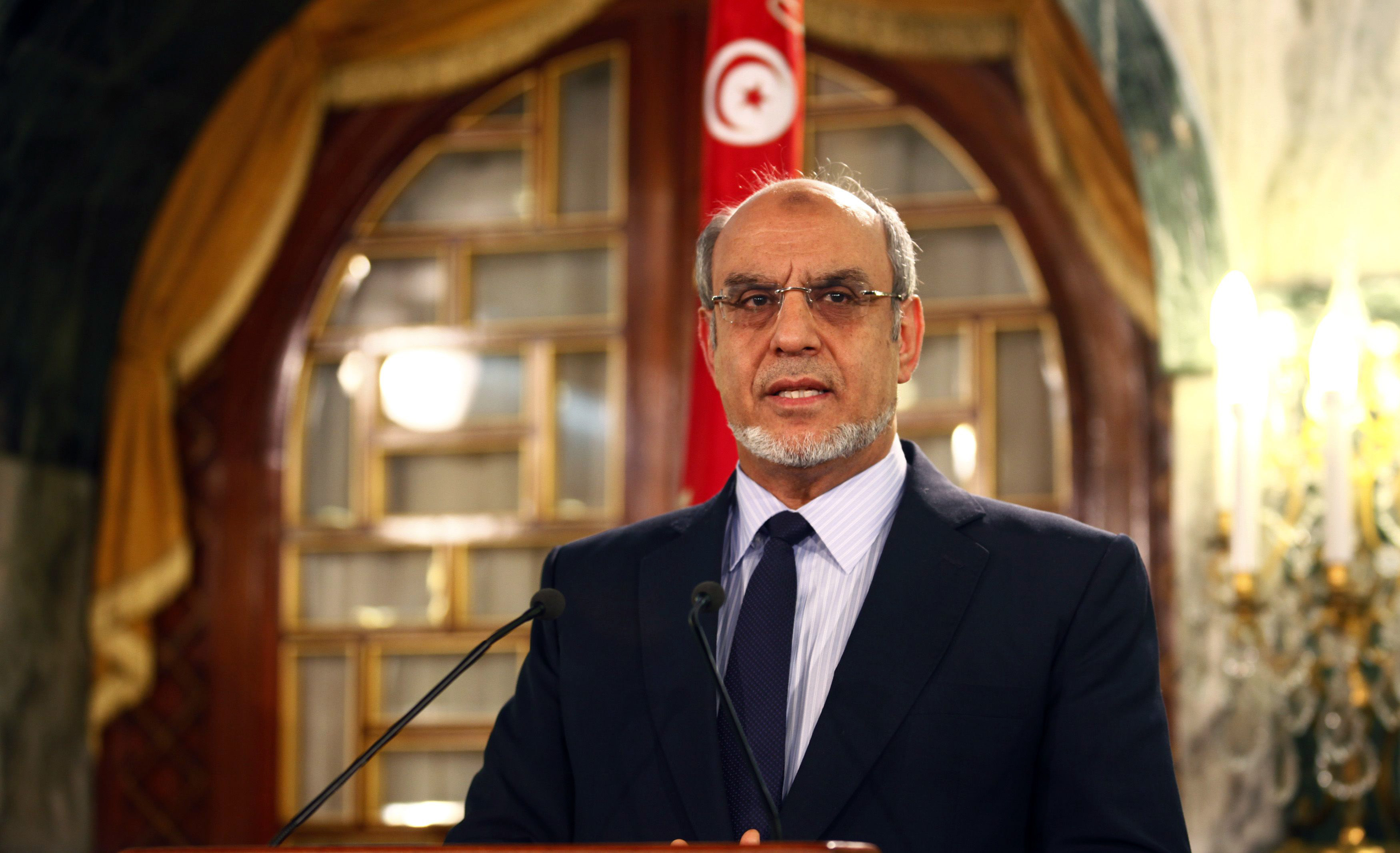 Tunisia's Prime Minister Hamadi Jebali speaks as he announces his resignation during a news conference in Tunis