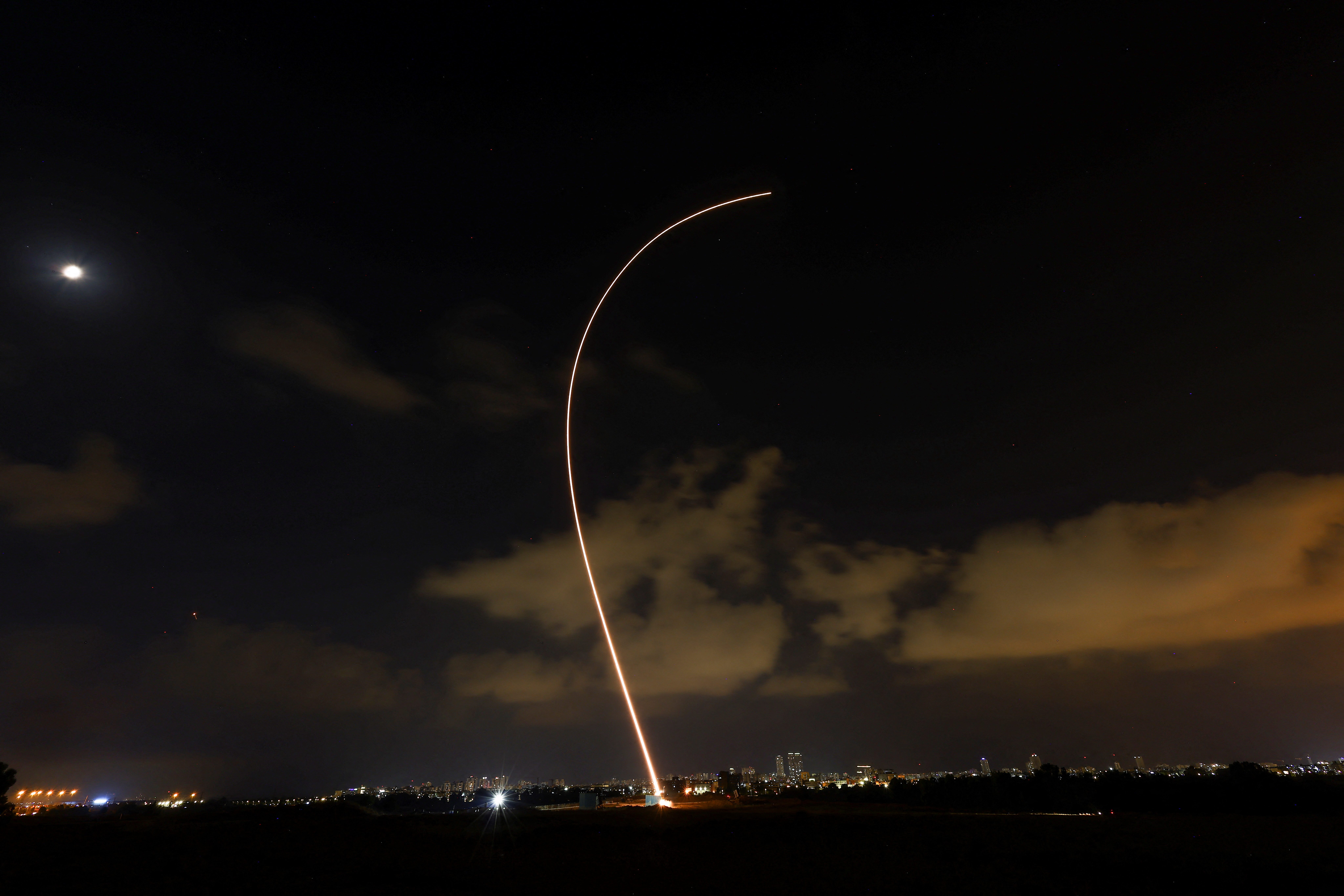 Israel's Iron Dome anti-missile system fires to intercept a rocket launched from the Gaza Strip towards Israel near Ashdod, Israel