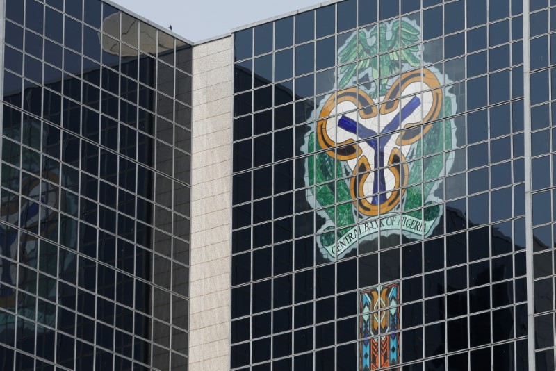 The Central Bank of Nigeria's logo is seen on its headquarters in Abuja
