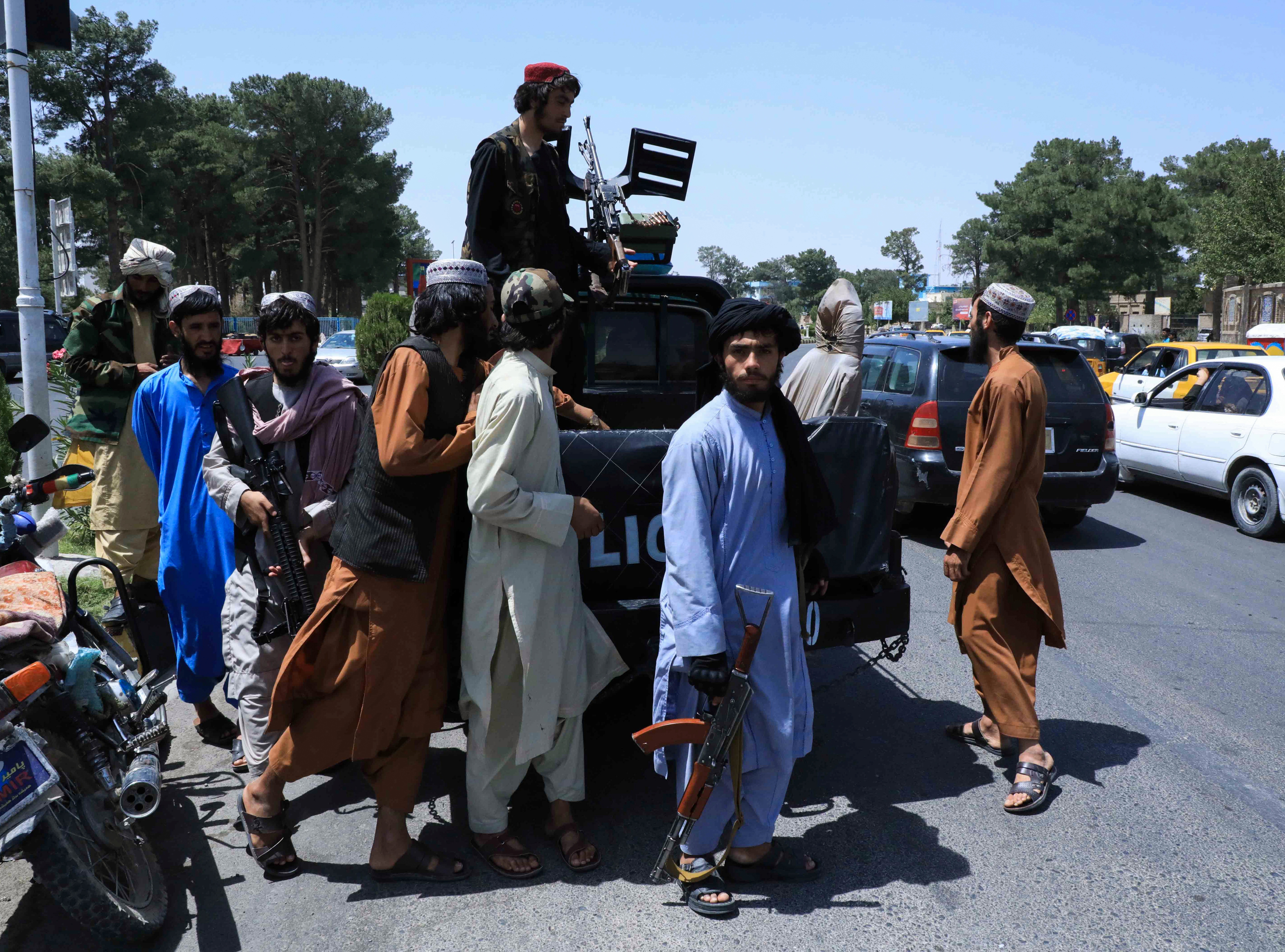 Taliban forces patrol a street in Herat, Afghanistan August 14, 2021. REUTERS/Stringer