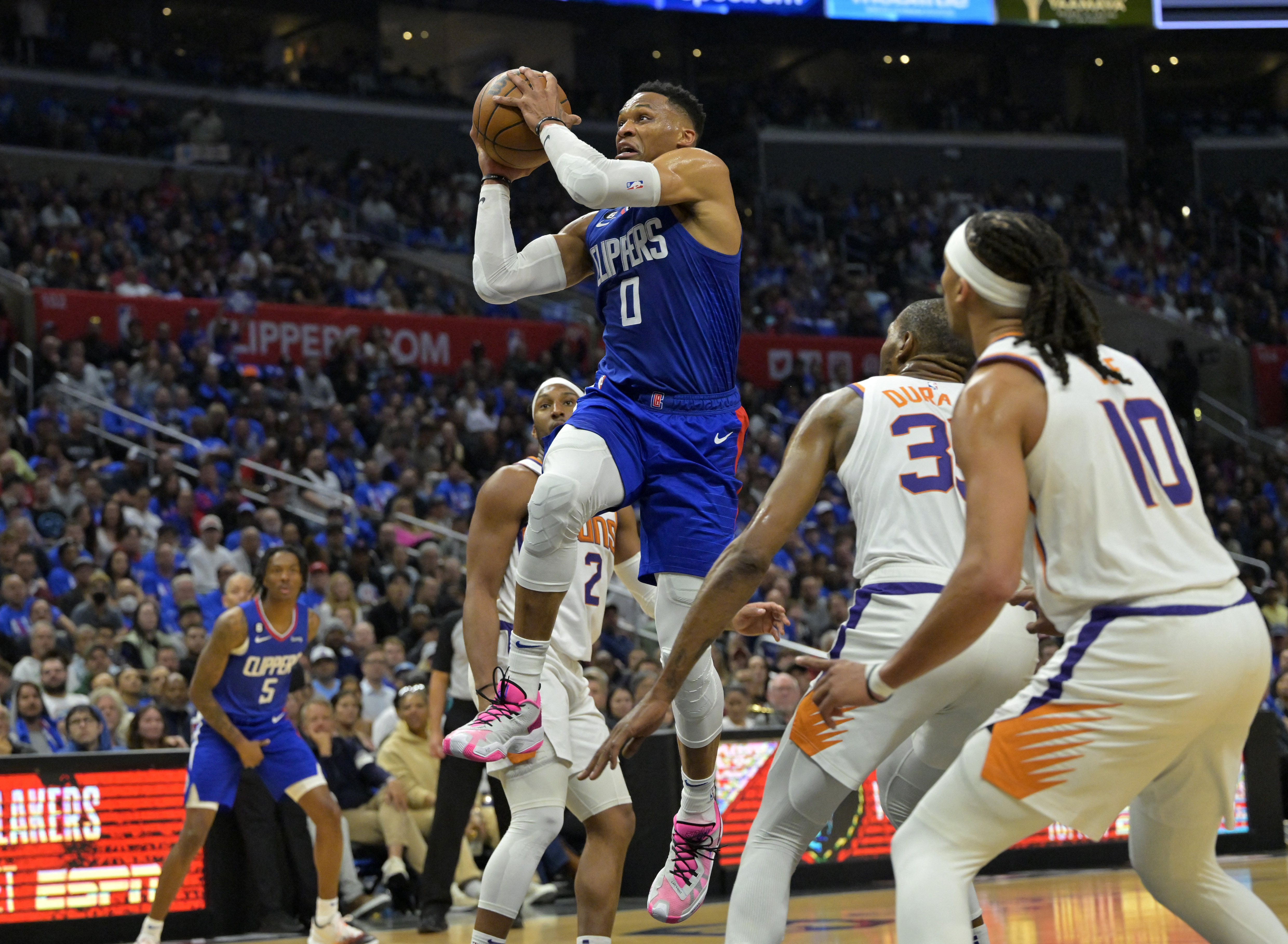 Booker has 45 points, Suns top Leonard-less Clippers 129-124