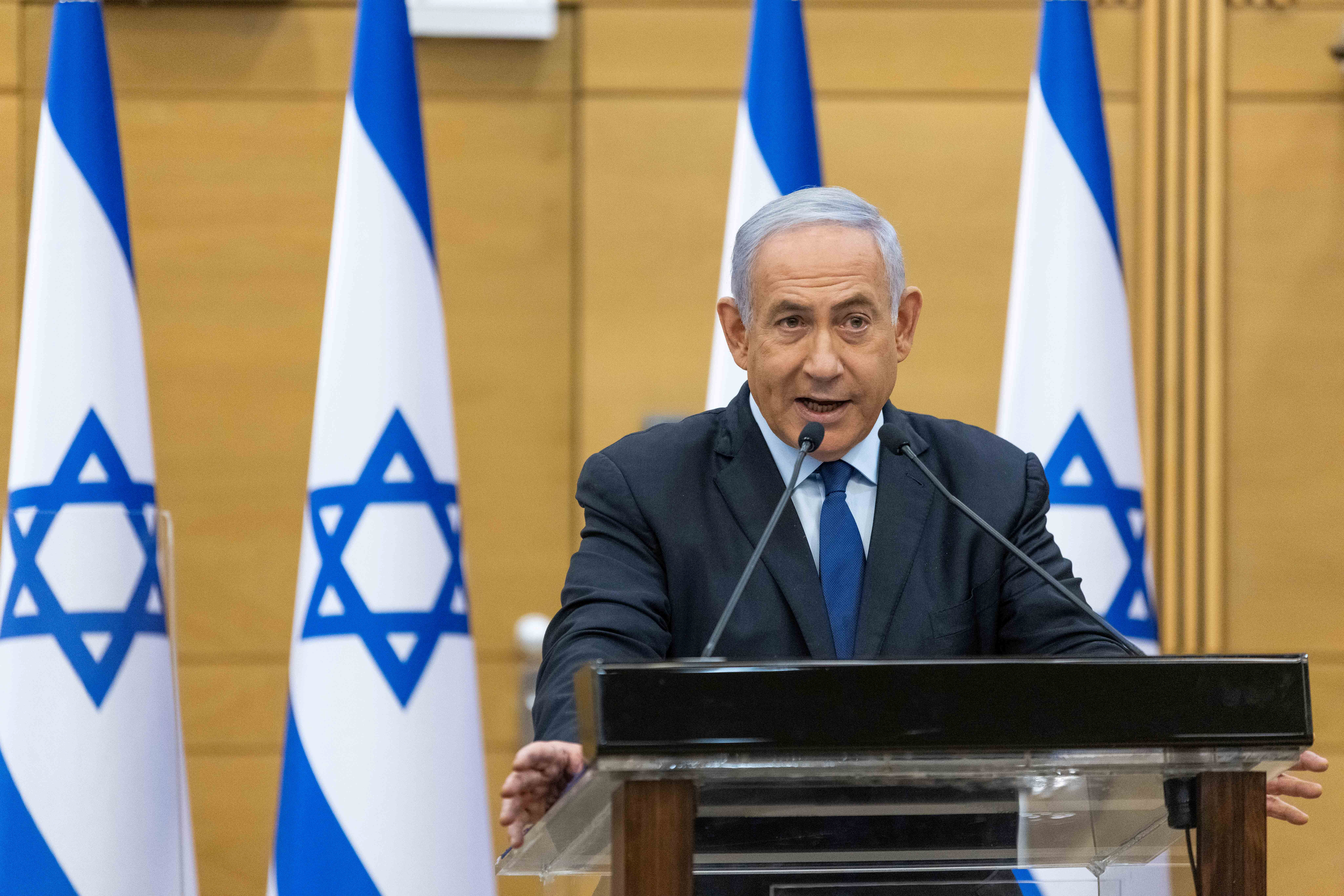 Israeli Prime Minister Benjamin Netanyahu delivers a statement in the Knesset, the Israeli Parliament, in Jerusalem