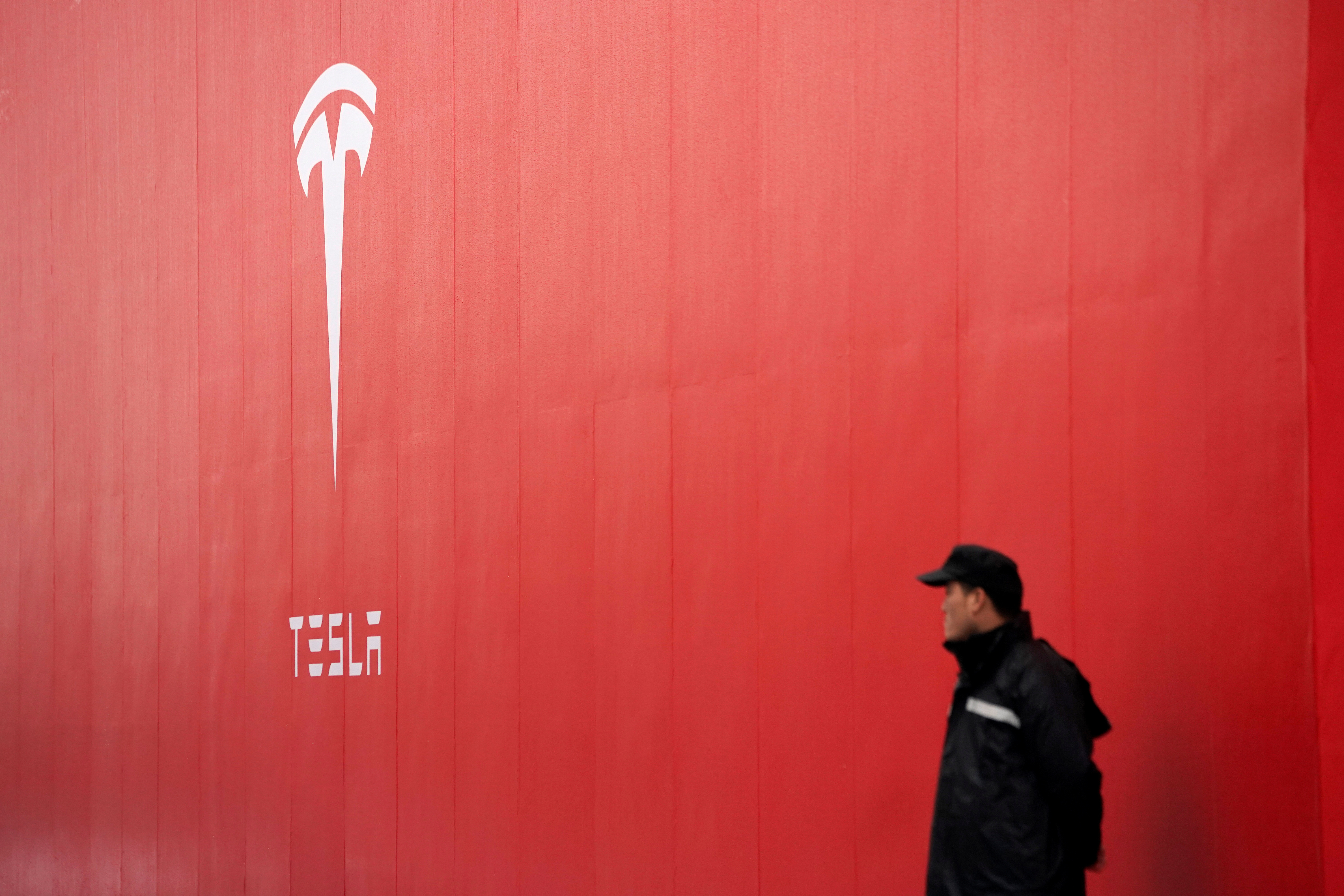 A Tesla logo is seen at a groundbreaking ceremony of Tesla Shanghai Gigafactory in Shanghai
